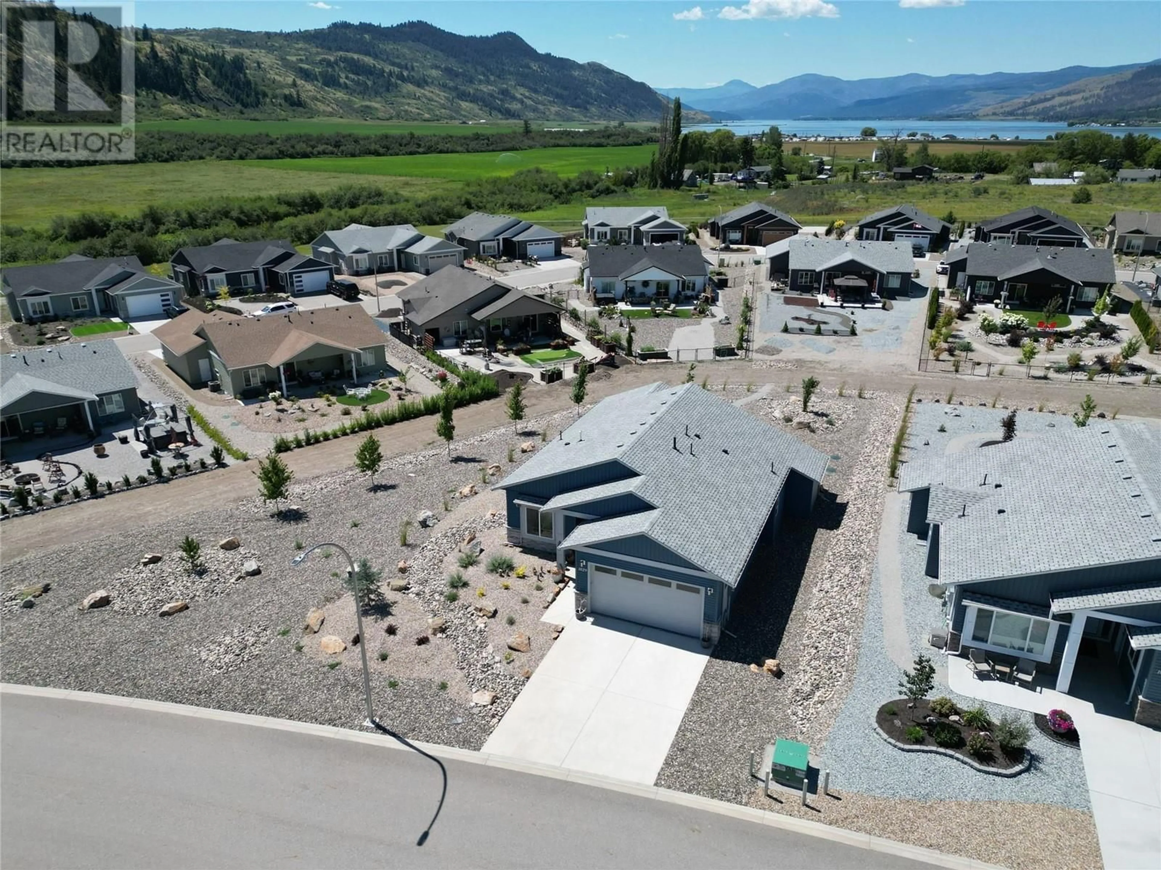 A pic from outside/outdoor area/front of a property/back of a property/a pic from drone, mountain view for 1029 10TH AVENUE, Vernon British Columbia V1H1Z1