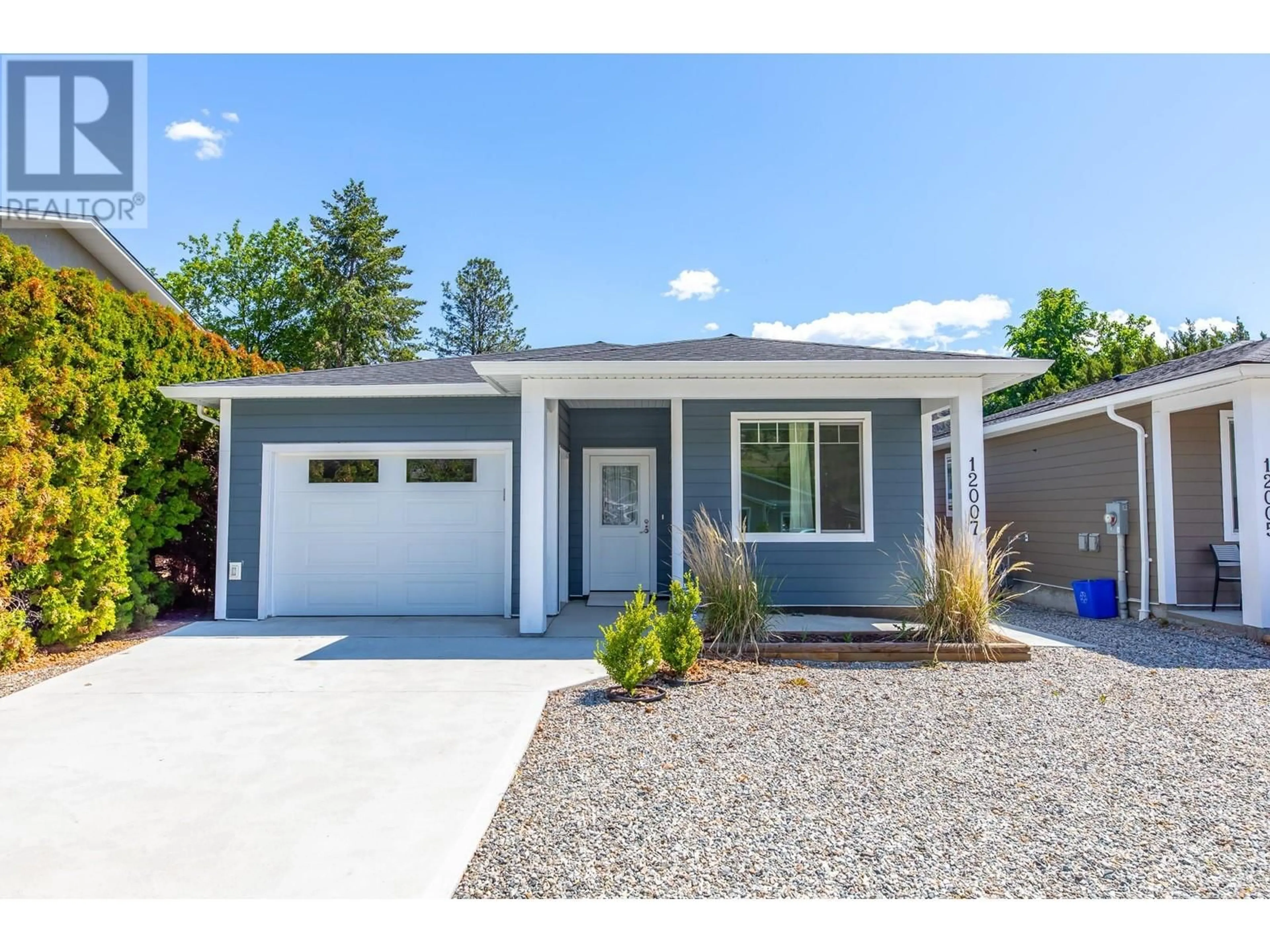 Home with vinyl exterior material, street for 12007 SINCLAIR ROAD, Summerland British Columbia V0H1Z8