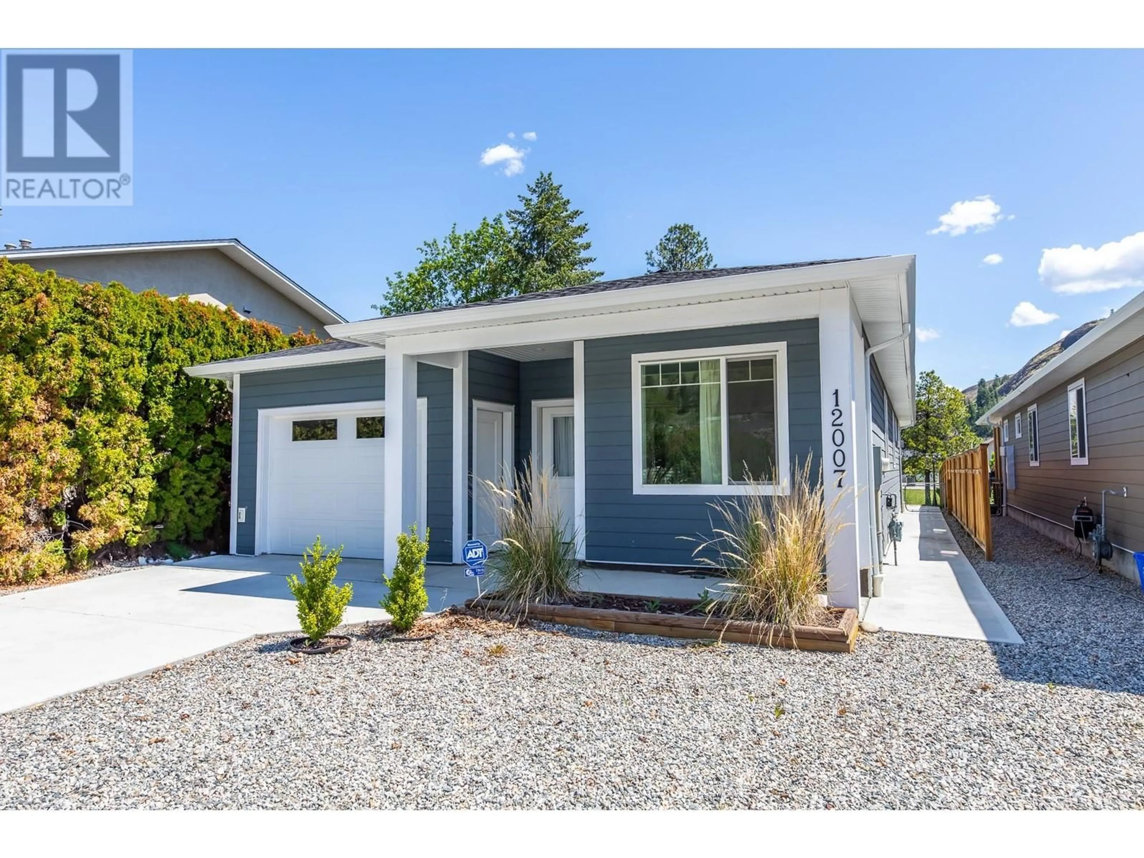 Home with vinyl exterior material, street for 12007 SINCLAIR ROAD, Summerland British Columbia V0H1Z8