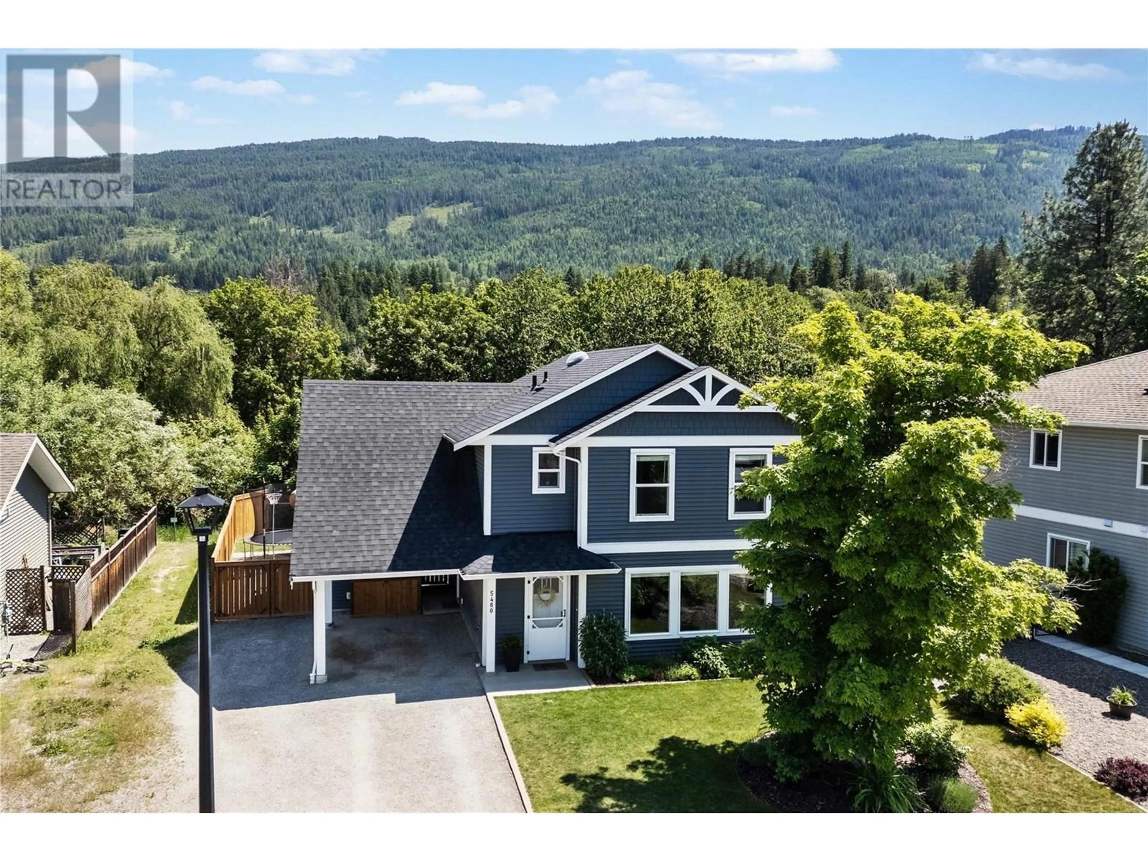 A pic from outside/outdoor area/front of a property/back of a property/a pic from drone, mountain view for 5840 73 AVENUE NORTHEAST, Salmon Arm British Columbia V0E1K0