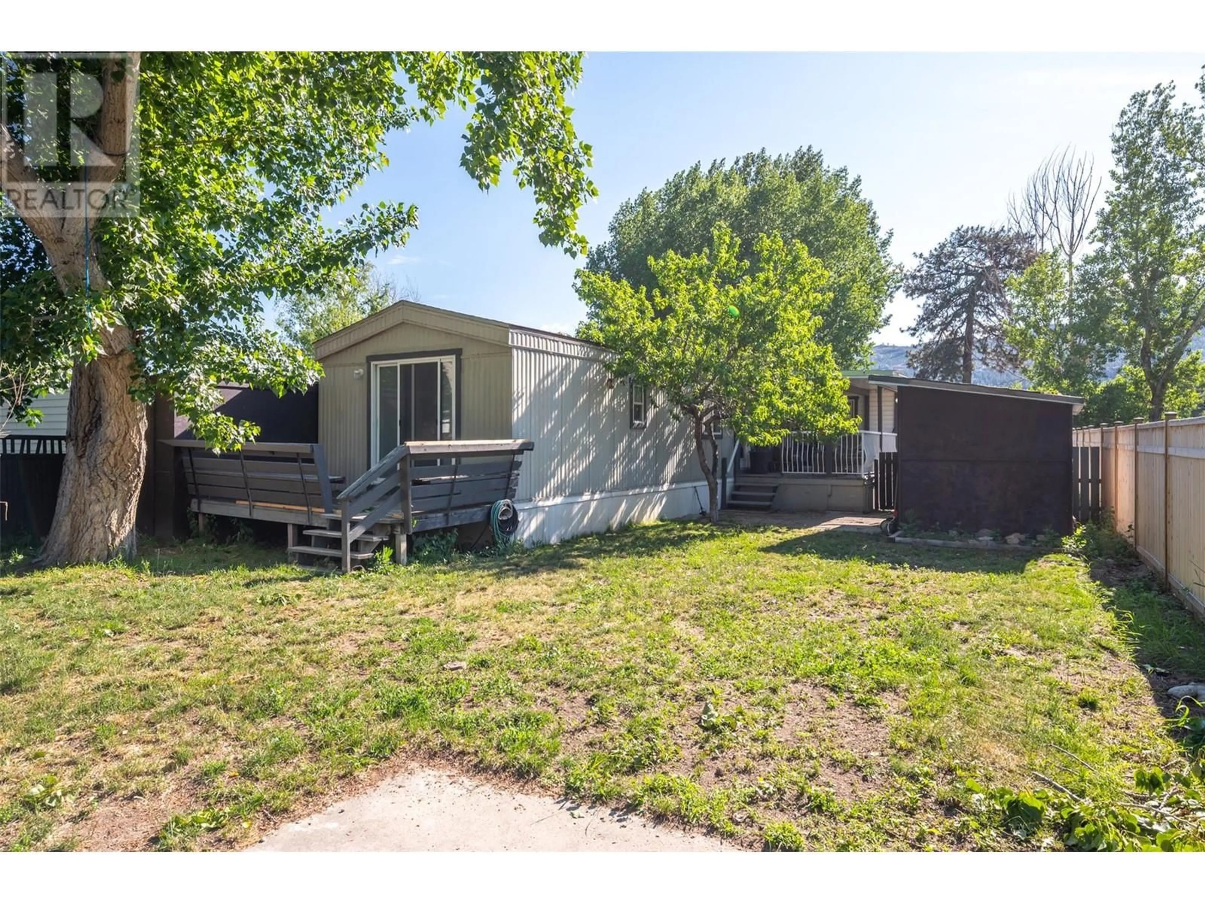 A pic from outside/outdoor area/front of a property/back of a property/a pic from drone, street for 96 - 3999 SKAHA LAKE ROAD, Penticton British Columbia V2A6J7