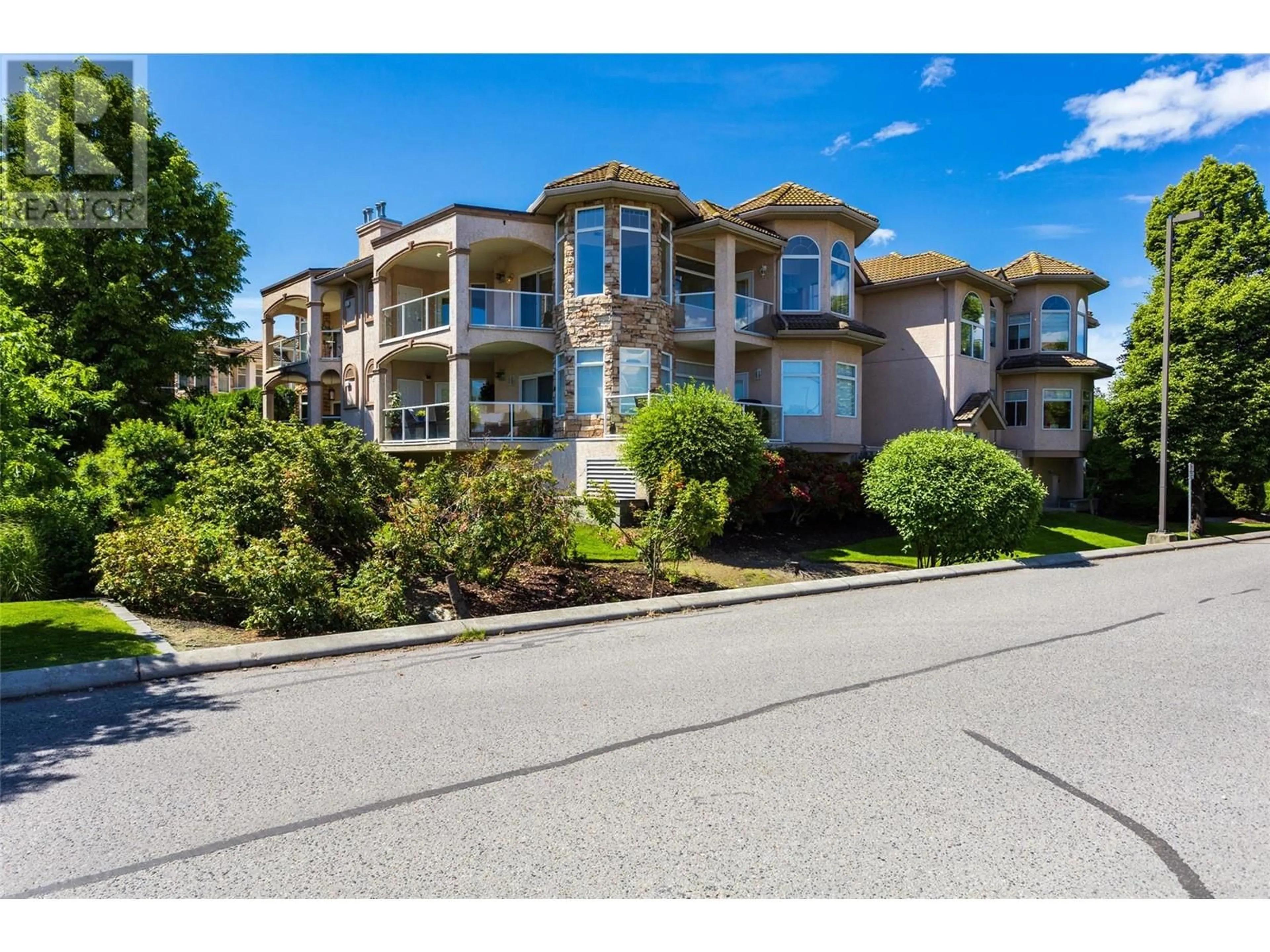 A pic from outside/outdoor area/front of a property/back of a property/a pic from drone, street for 311 - 634 LEQUIME ROAD, Kelowna British Columbia V1W1A4
