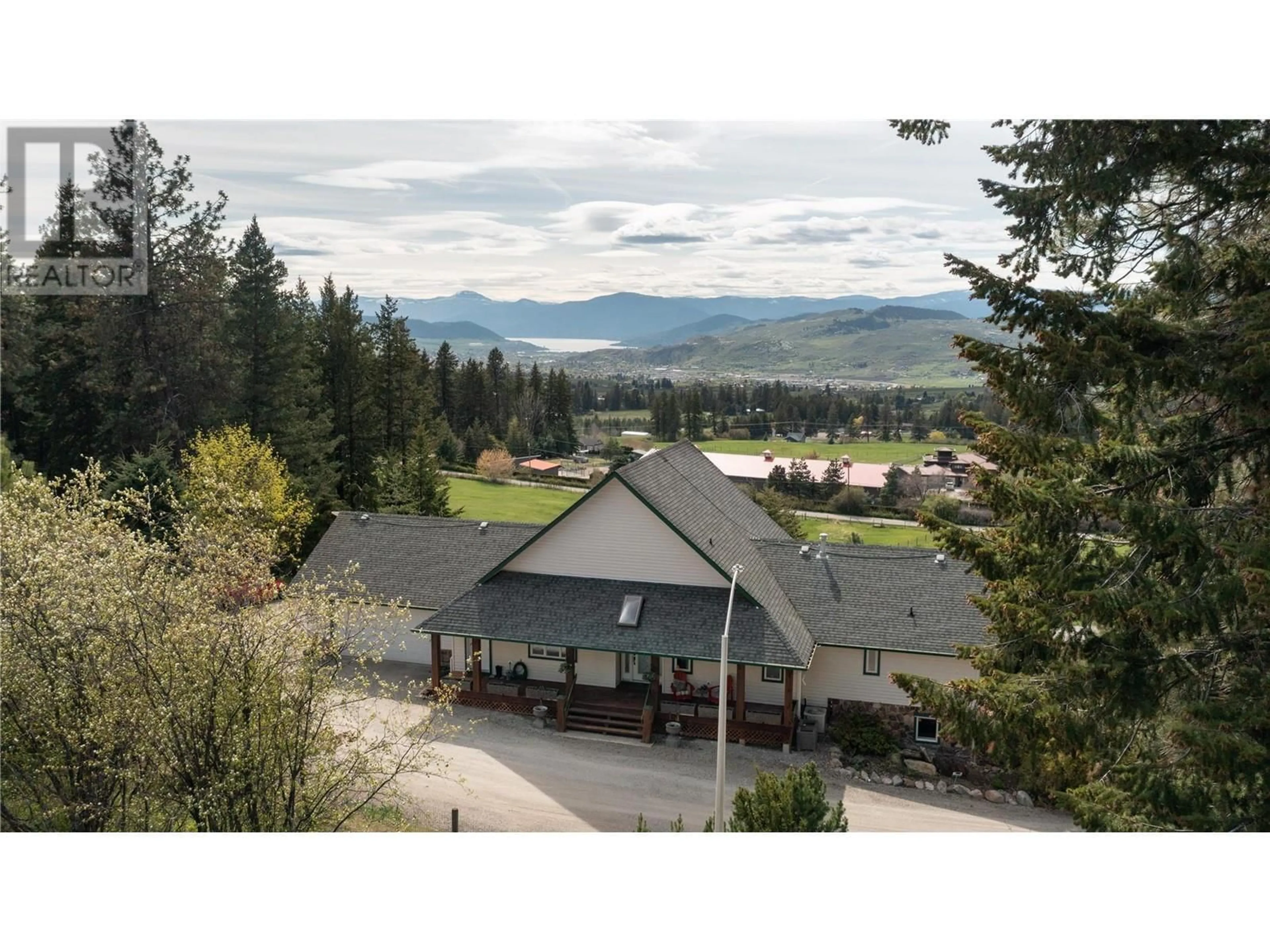A pic from outside/outdoor area/front of a property/back of a property/a pic from drone, mountain view for 6435 DIXON DAM ROAD, Vernon British Columbia V1B3J9