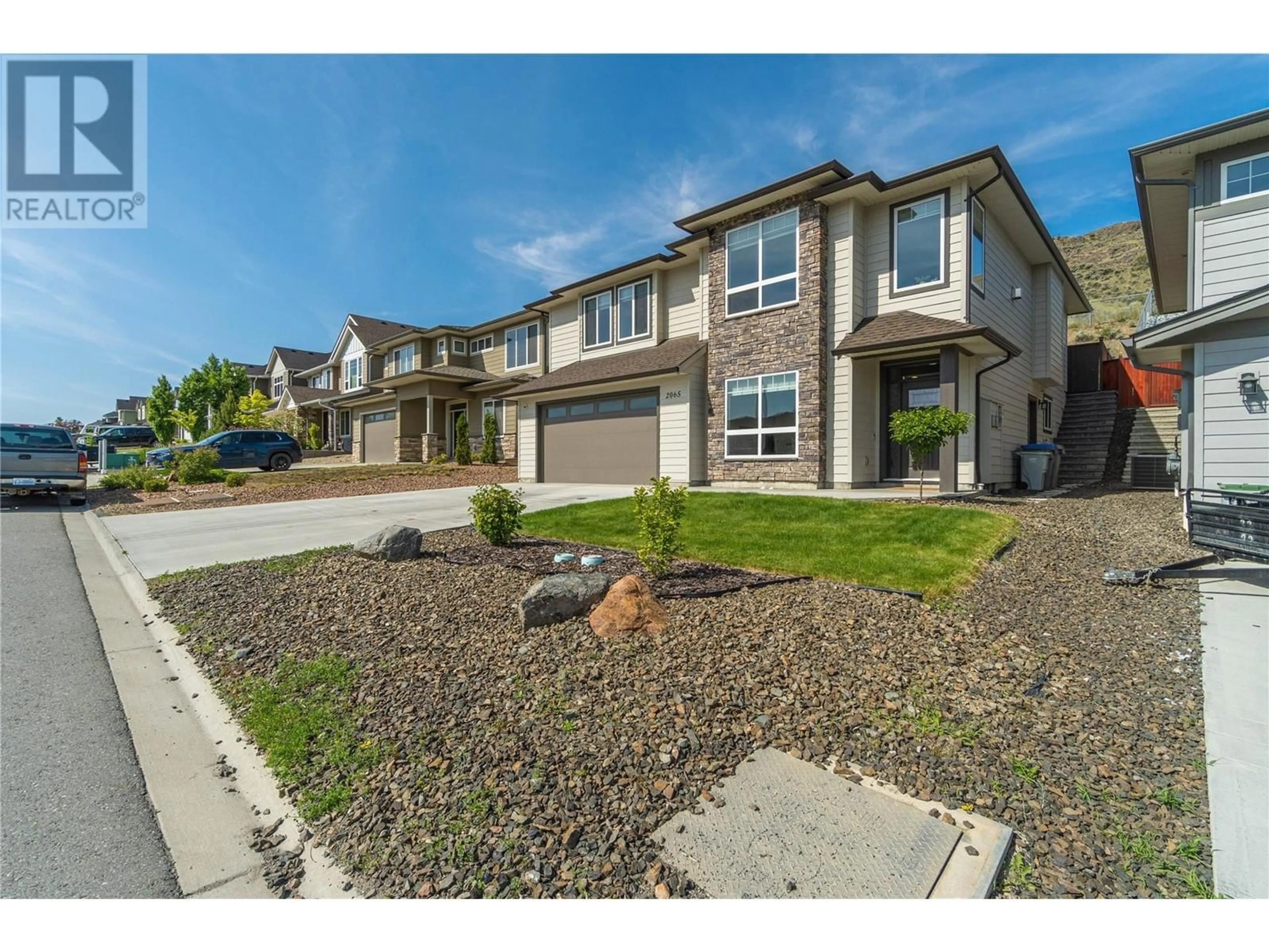 A pic from outside/outdoor area/front of a property/back of a property/a pic from drone, street for 2065 SADDLEBACK DRIVE, Kamloops British Columbia V2B0H2