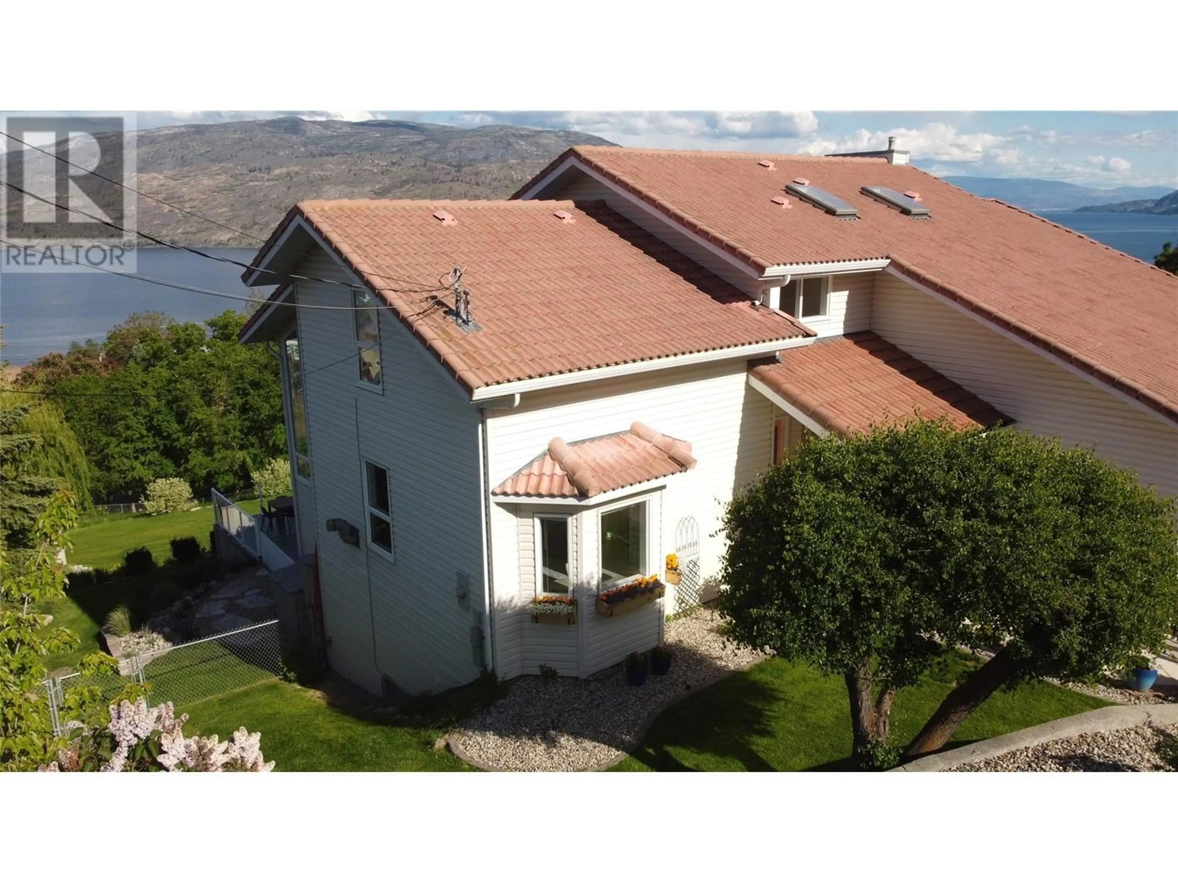 A pic from outside/outdoor area/front of a property/back of a property/a pic from drone, unknown for 6057 ELLISON AVENUE, Peachland British Columbia V0H1X4