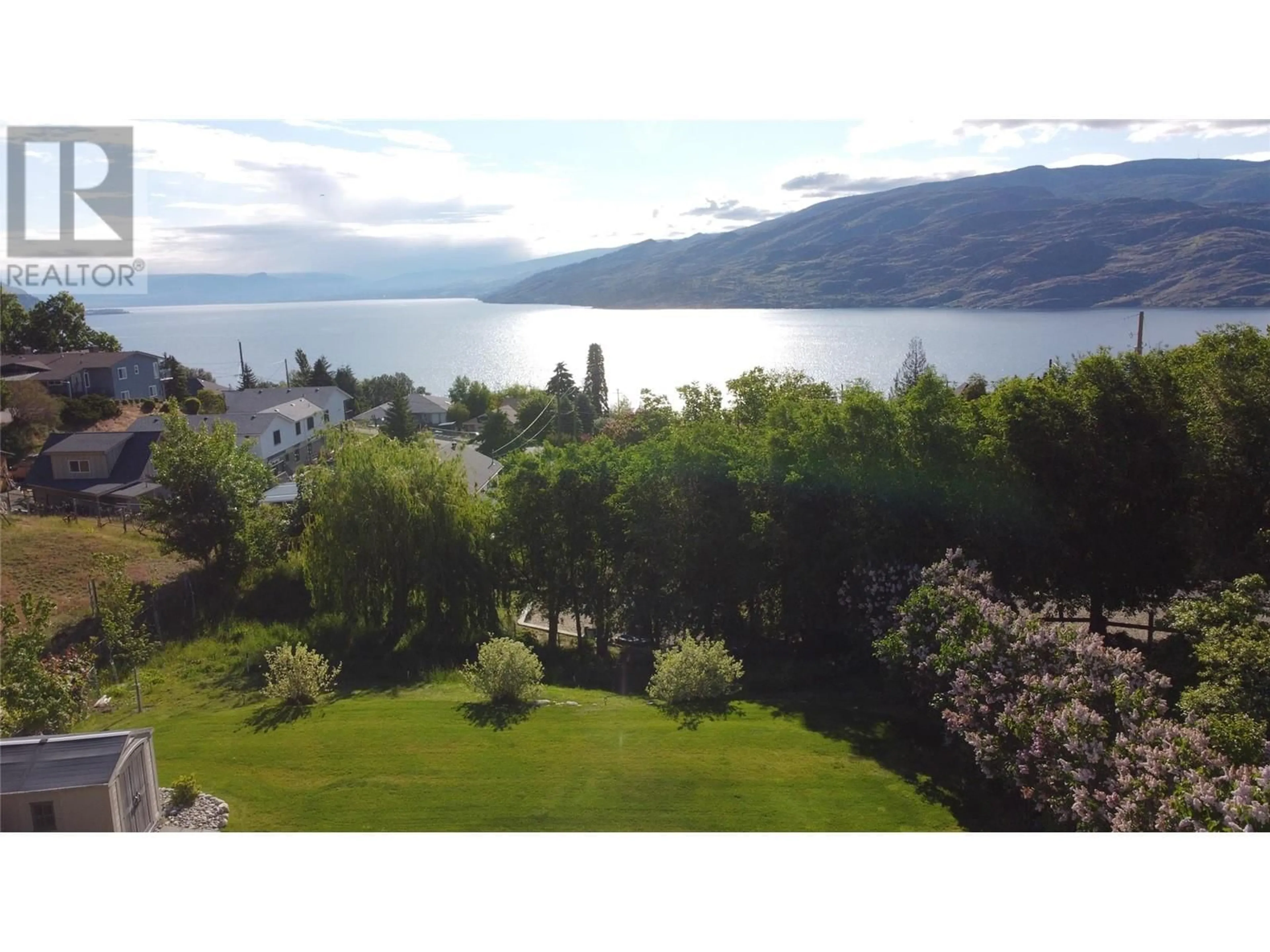 A pic from outside/outdoor area/front of a property/back of a property/a pic from drone, water/lake/river/ocean view for 6057 ELLISON AVENUE, Peachland British Columbia V0H1X4