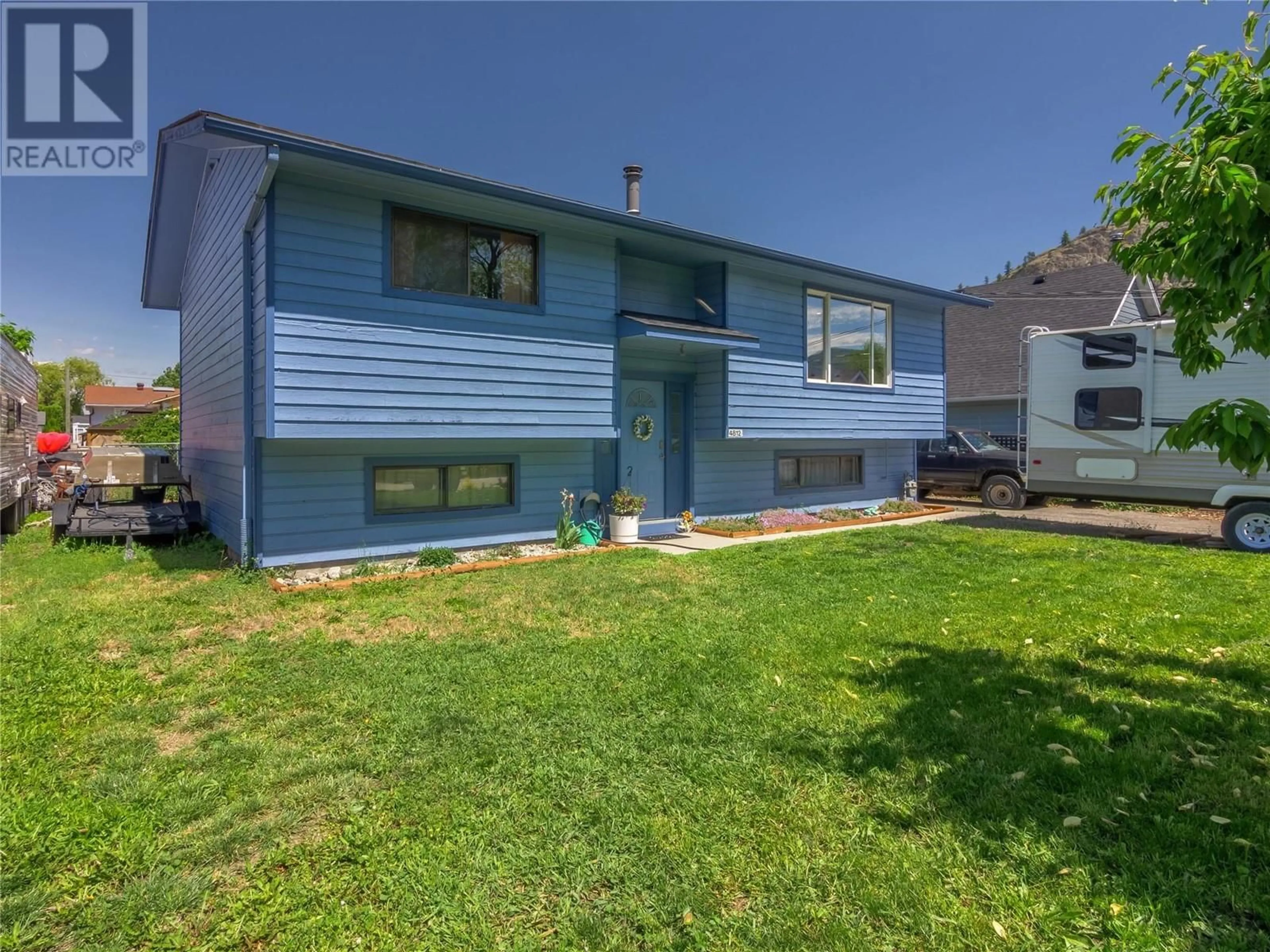 A pic from outside/outdoor area/front of a property/back of a property/a pic from drone, street for 4812 FERGUSON PLACE, Okanagan Falls British Columbia V0H1R2