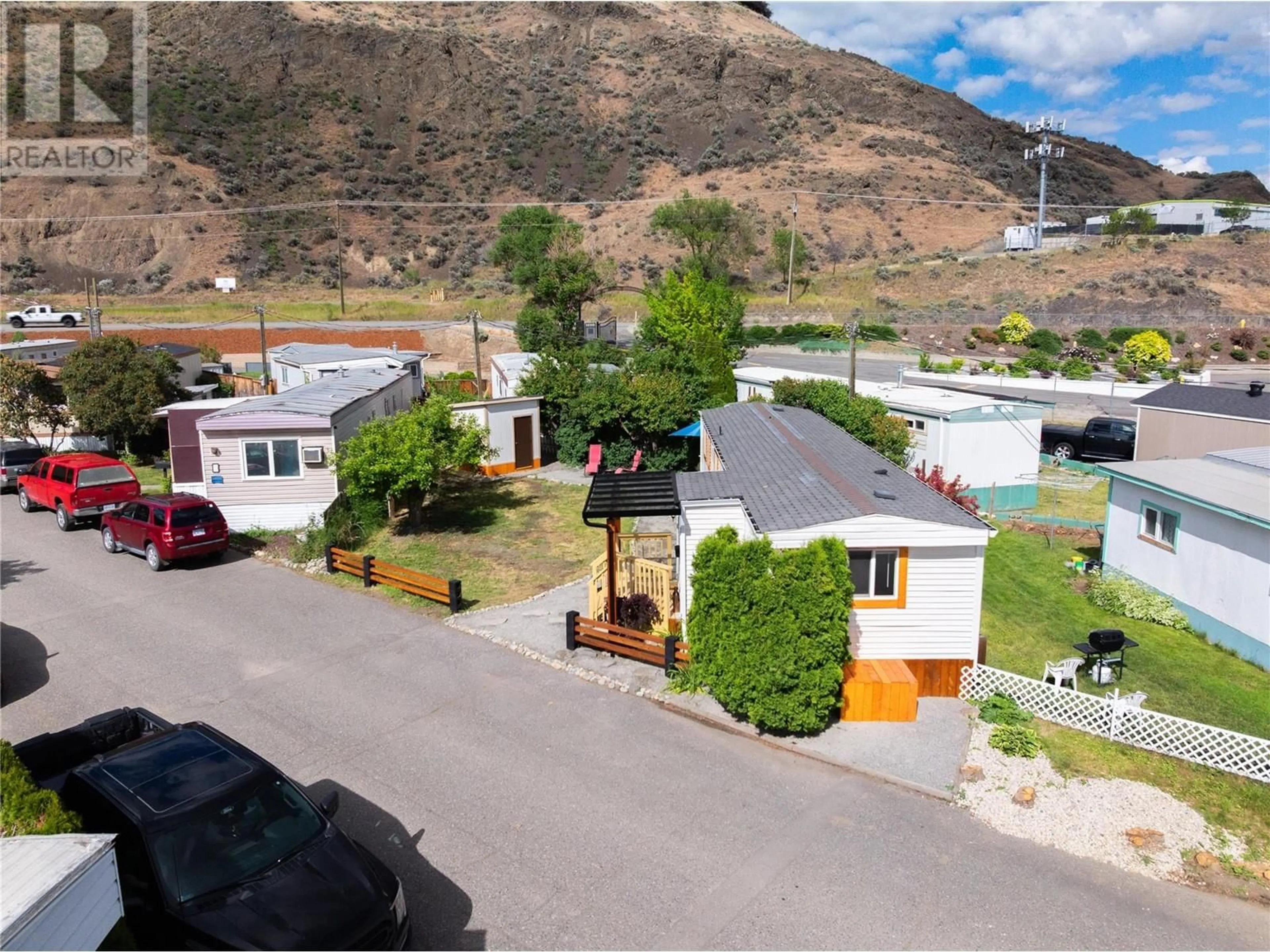 A pic from outside/outdoor area/front of a property/back of a property/a pic from drone, street for 11 - 1375 ORD ROAD, Kamloops British Columbia V2B7V3