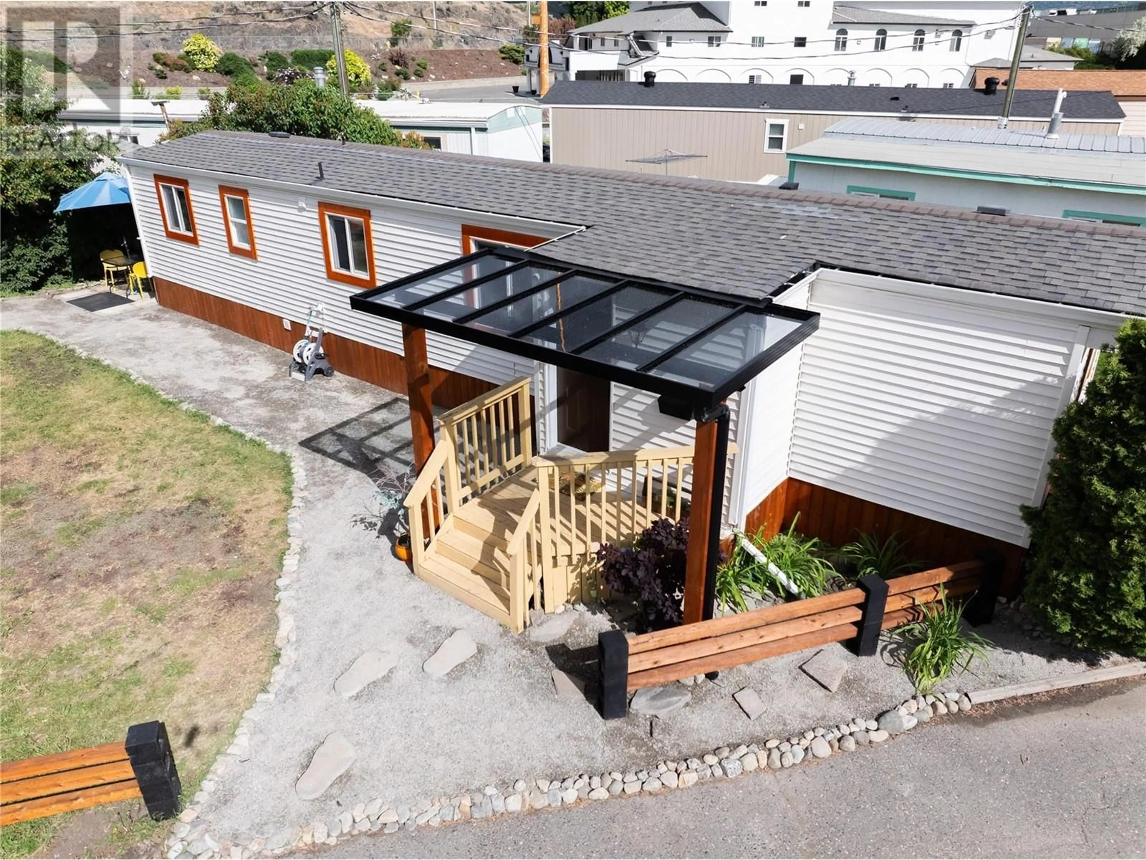 A pic from outside/outdoor area/front of a property/back of a property/a pic from drone, unknown for 11 - 1375 ORD ROAD, Kamloops British Columbia V2B7V3