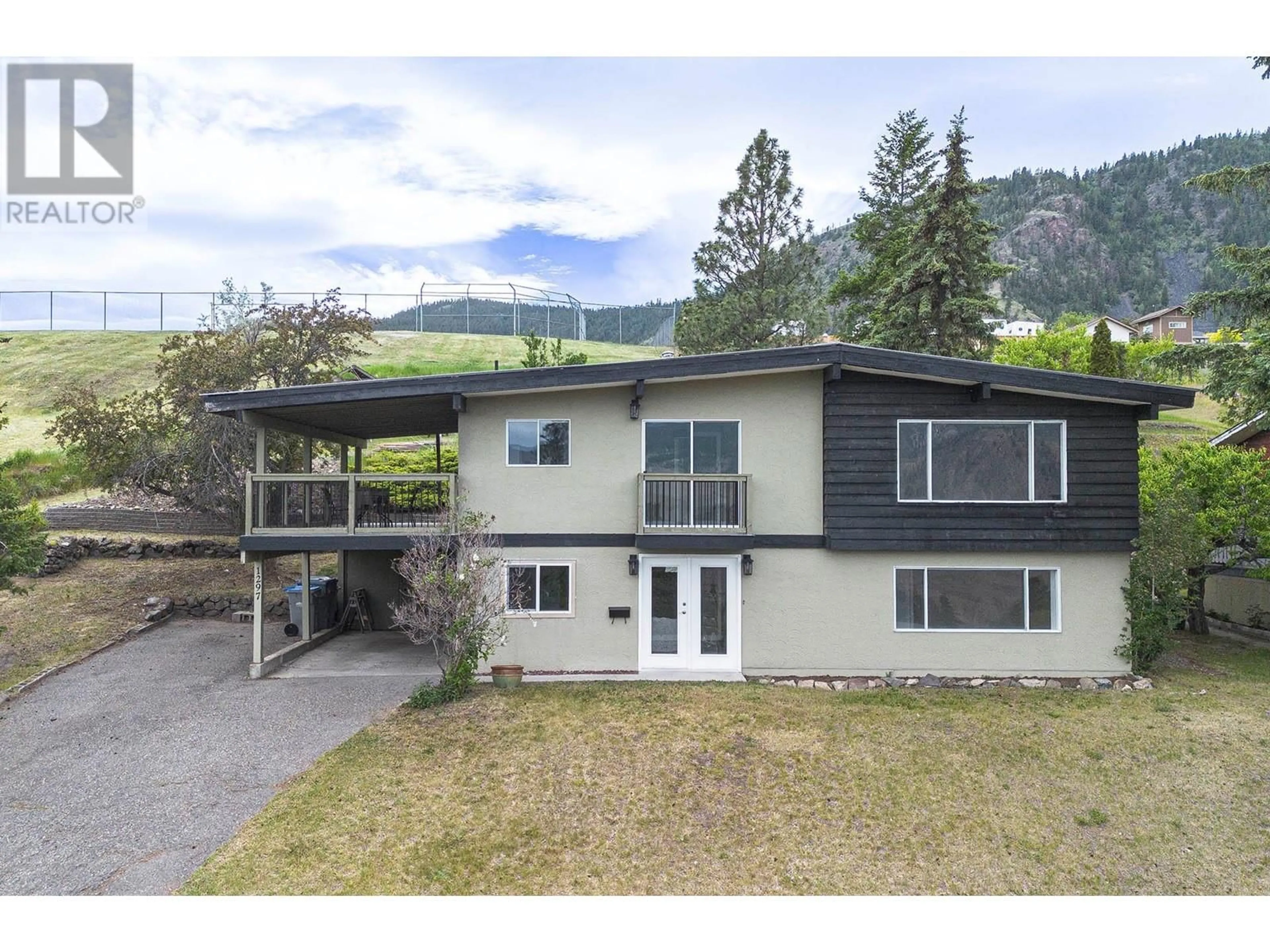 A pic from outside/outdoor area/front of a property/back of a property/a pic from drone, mountain view for 1297 BELAIR DRIVE, Kamloops British Columbia V2C5G3