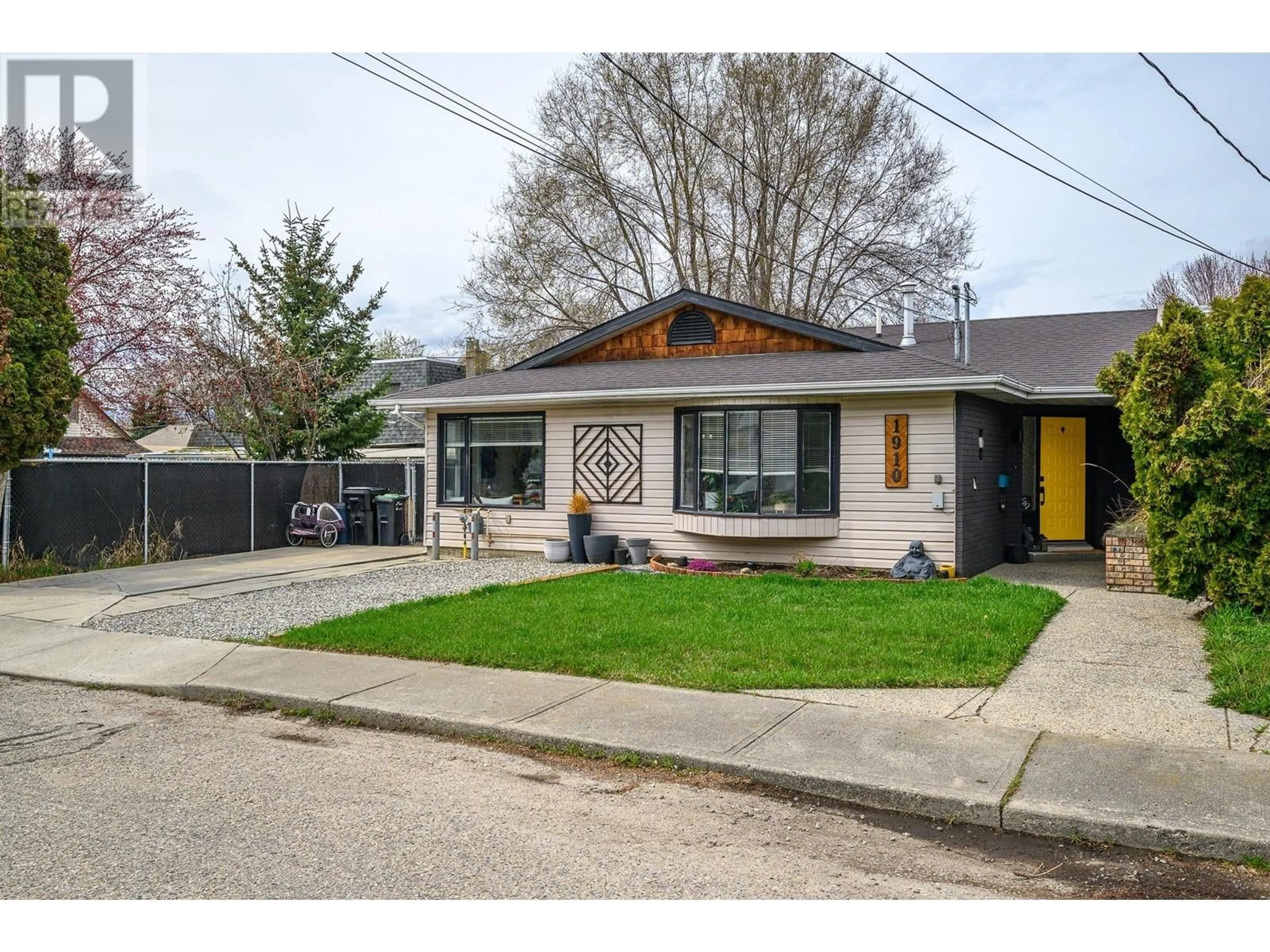Home with brick exterior material, street for 1910 42A STREET, Vernon British Columbia V1T9C5