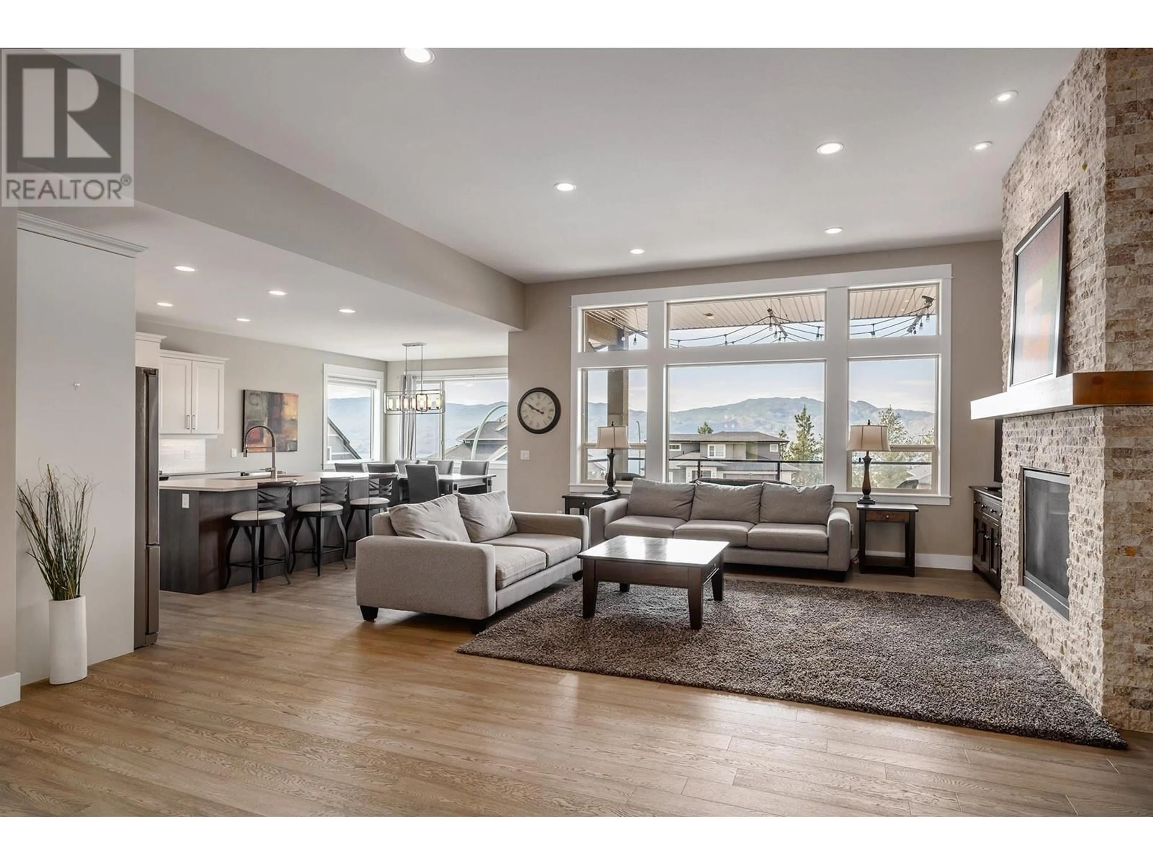Living room with furniture, wood/laminate floor for 3115 SAGEVIEW ROAD, West Kelowna British Columbia V4T3H2