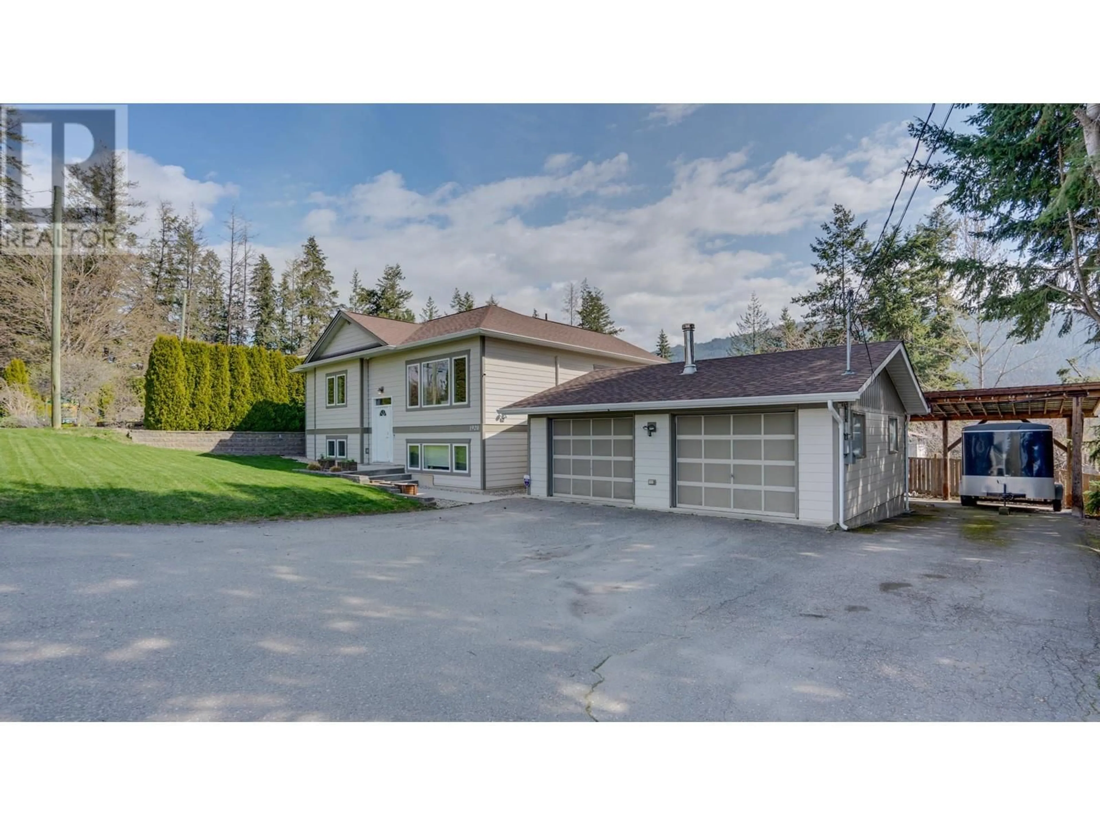 A pic from outside/outdoor area/front of a property/back of a property/a pic from drone, street for 1920 36TH STREET NORTHEAST, Salmon Arm British Columbia V1E2Z2