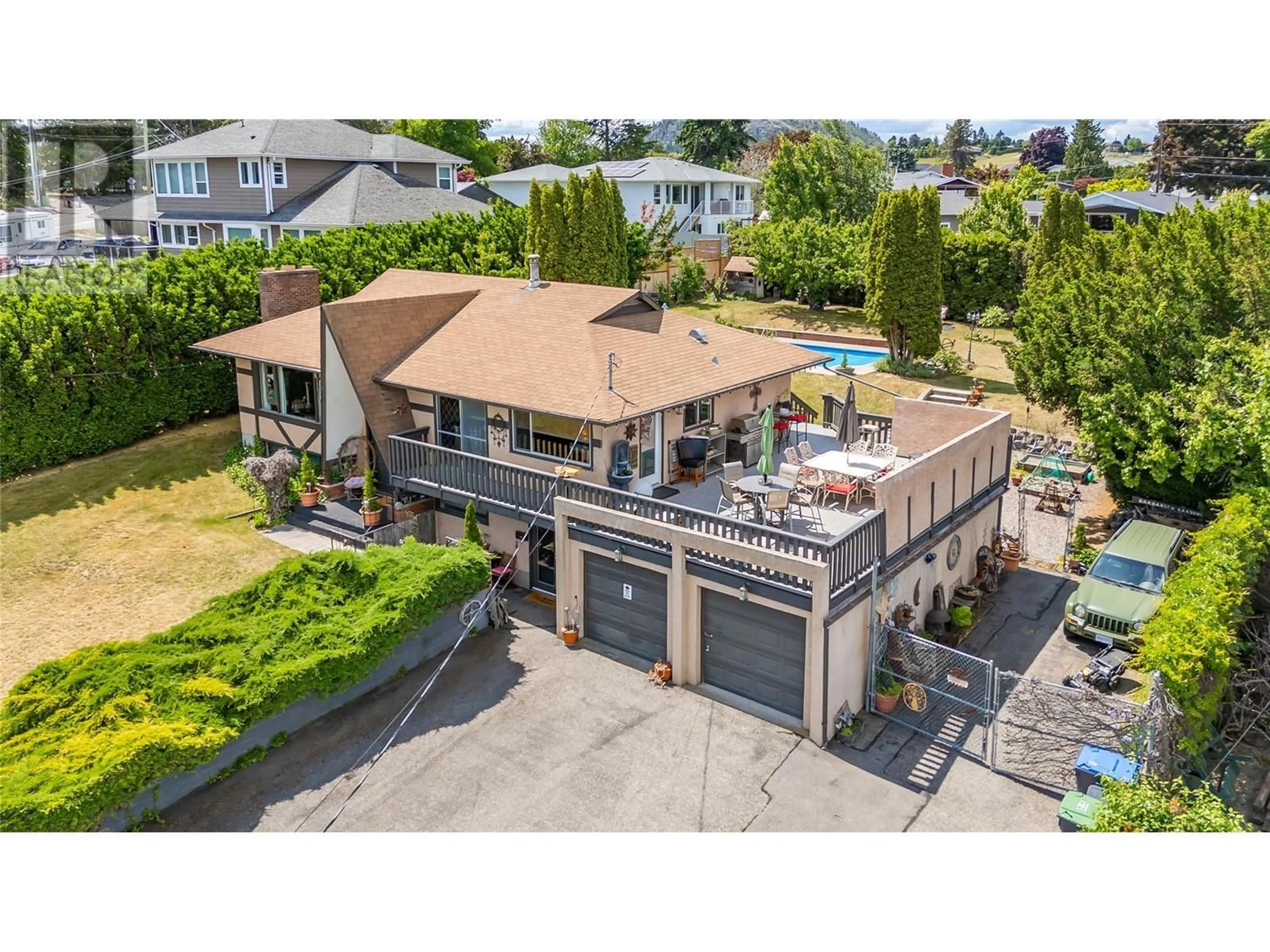 A pic from outside/outdoor area/front of a property/back of a property/a pic from drone, street for 2370 THACKER DRIVE, West Kelowna British Columbia V1Z1V8