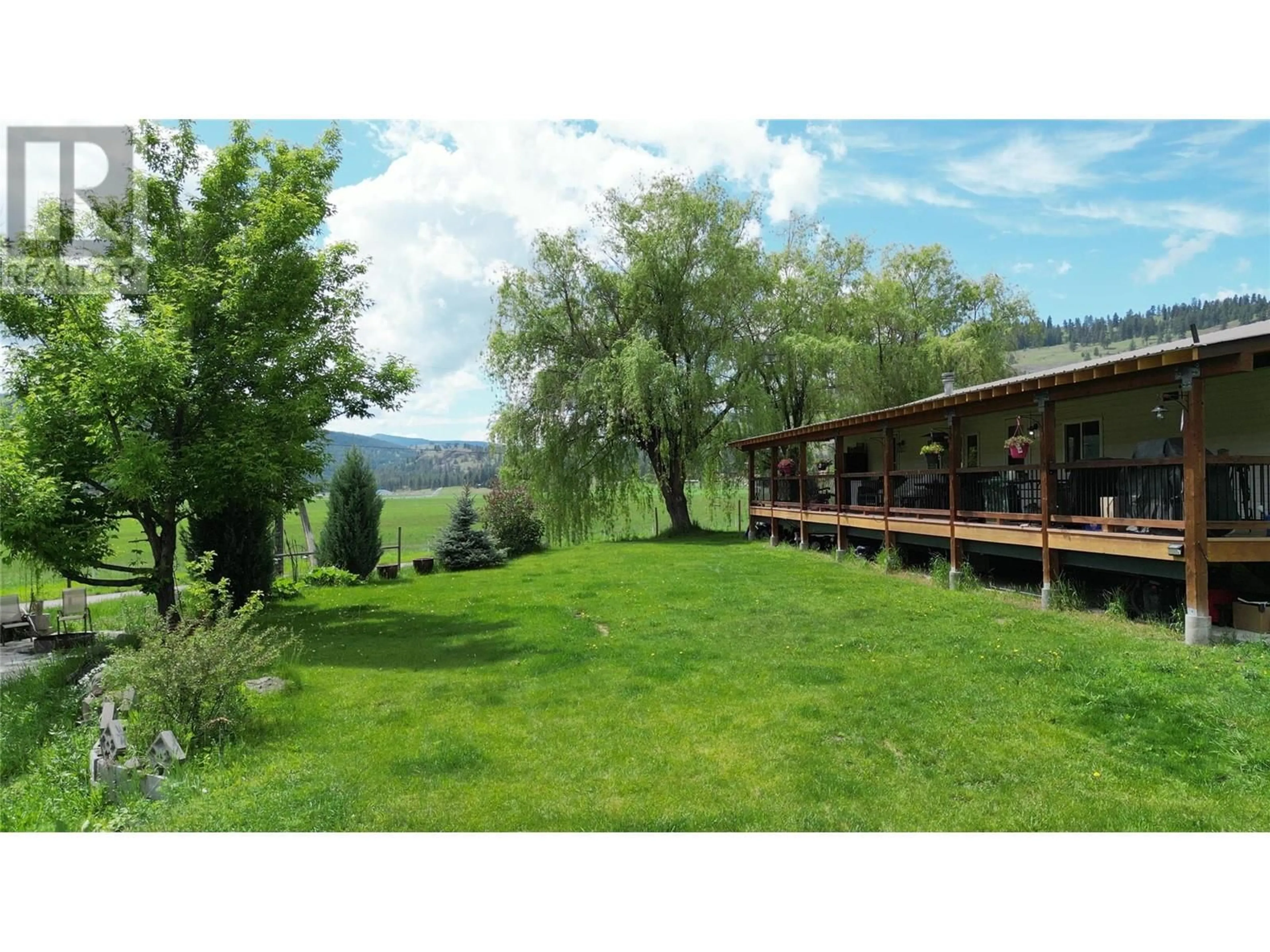 A pic from outside/outdoor area/front of a property/back of a property/a pic from drone, water/lake/river/ocean view for 1665 PEACOCK ROAD, Rock Creek British Columbia V0H1Y0