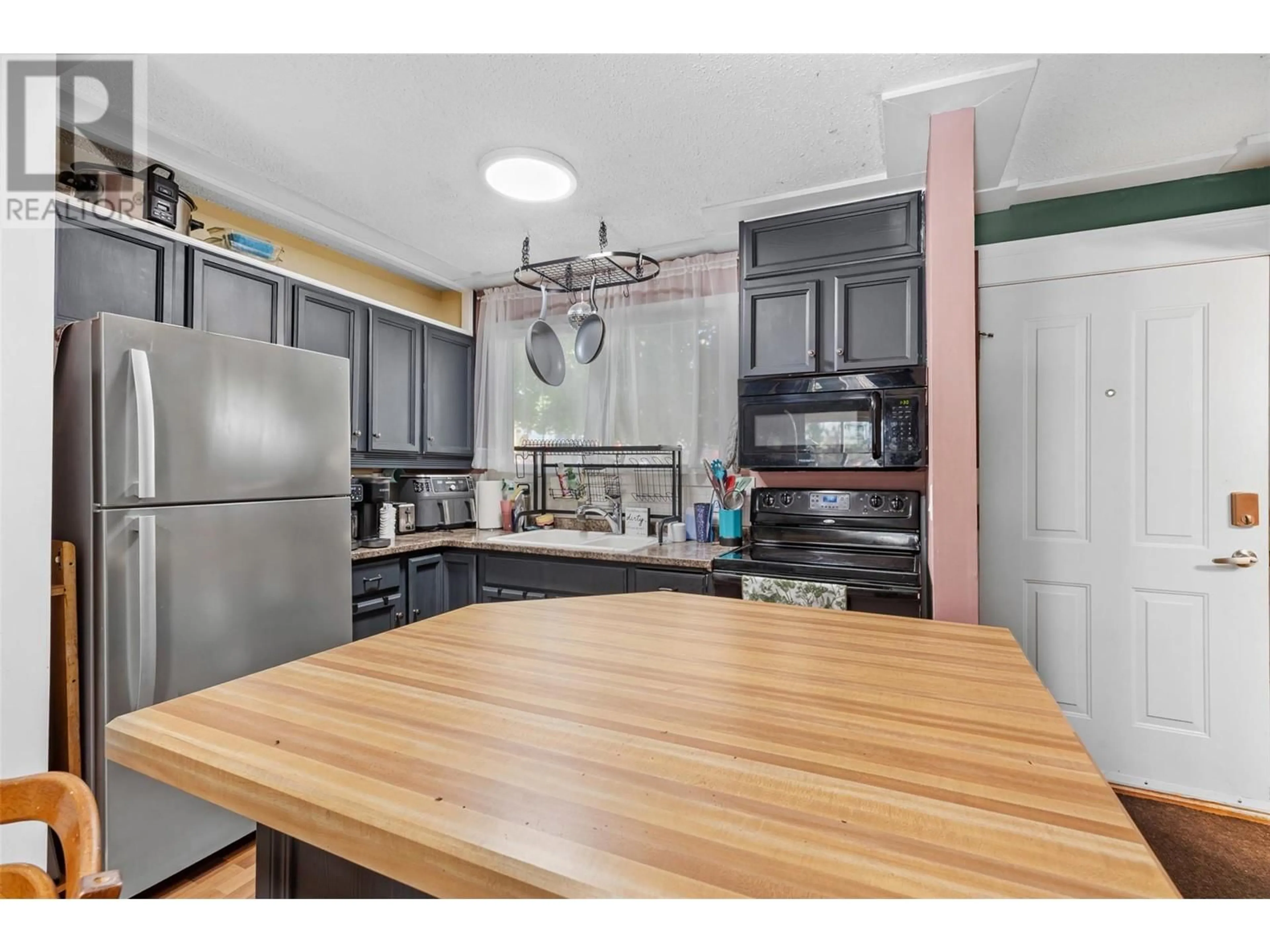 Open concept kitchen, unknown for 11 - 1153 BERNARD AVENUE, Kelowna British Columbia V1Y6R3