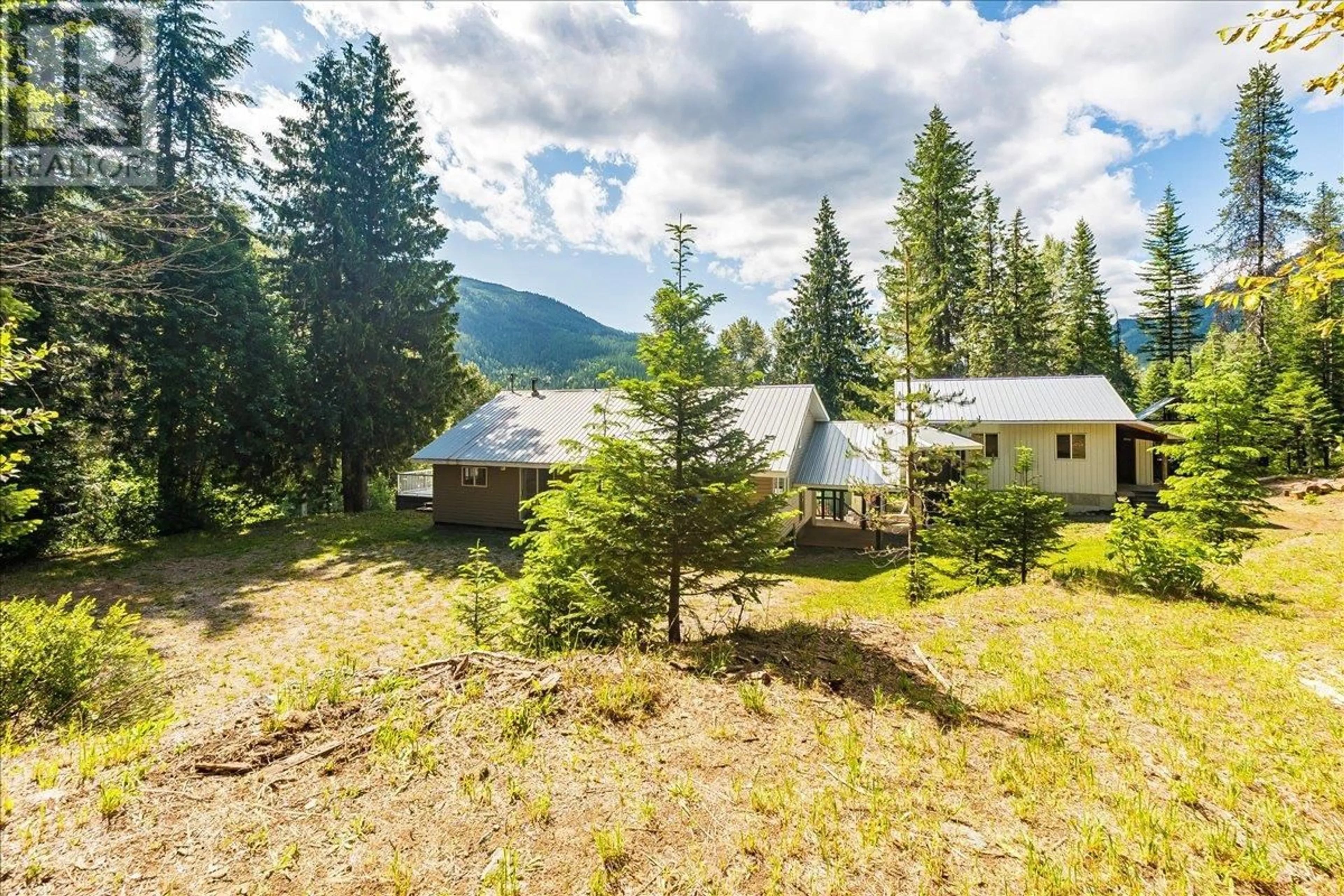A pic from outside/outdoor area/front of a property/back of a property/a pic from drone, mountain view for 5270 CALLBECK ROAD, Nelson British Columbia V1L6N2