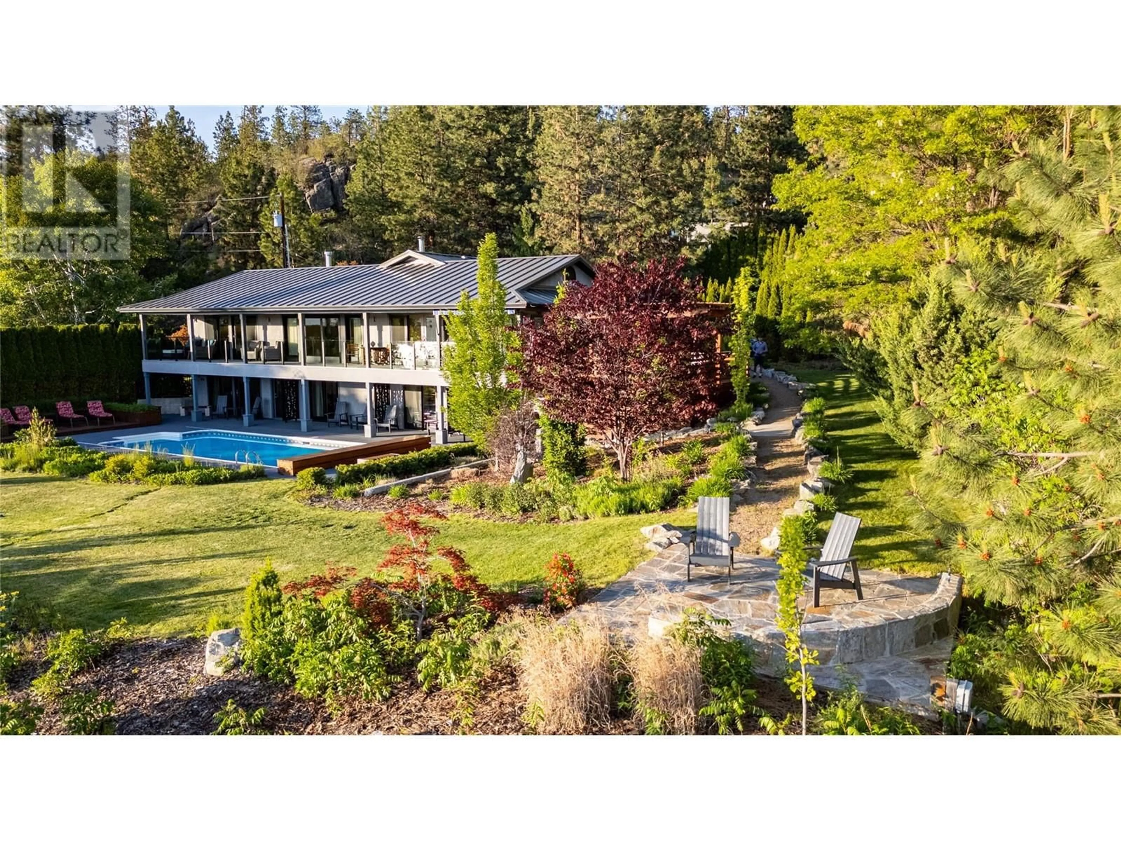 A pic from outside/outdoor area/front of a property/back of a property/a pic from drone, water/lake/river/ocean view for 1306 SMETHURST ROAD, Naramata British Columbia V0H1N0