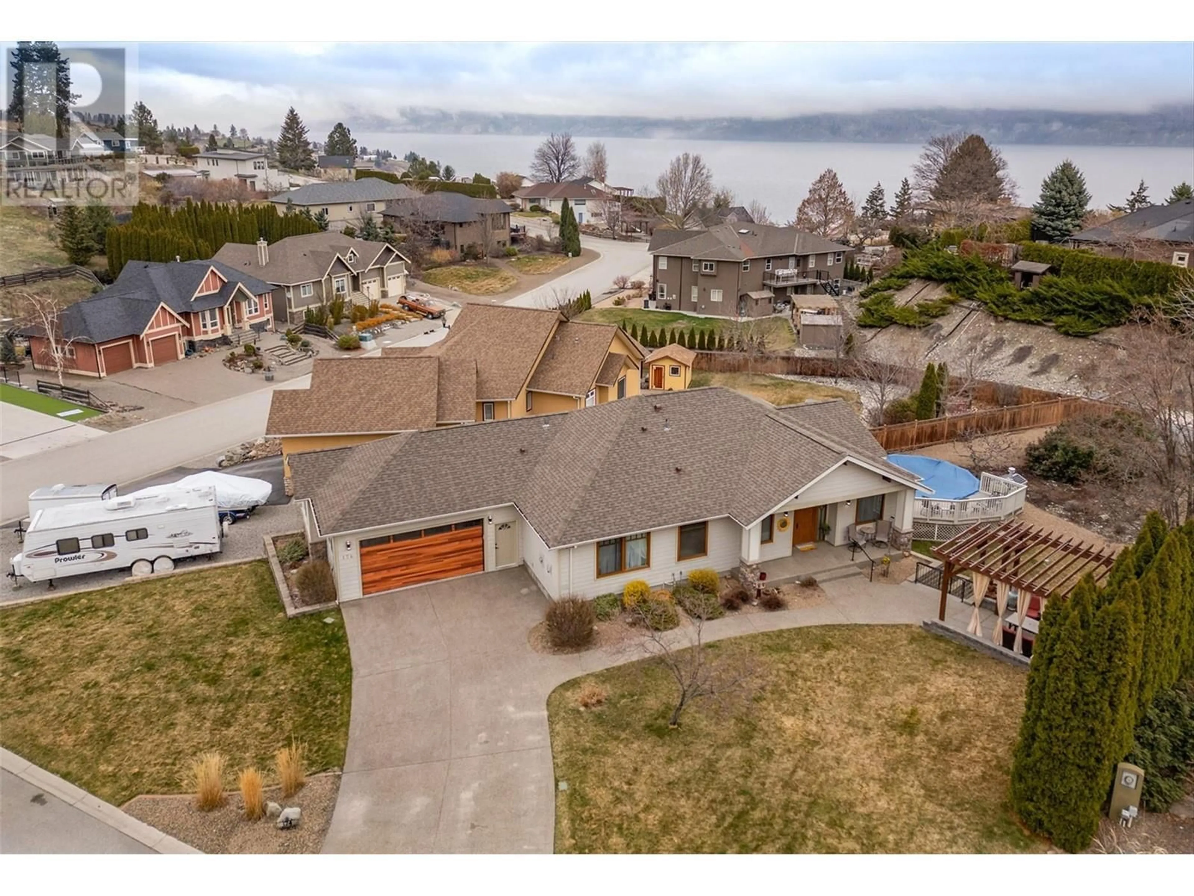 A pic from outside/outdoor area/front of a property/back of a property/a pic from drone, water/lake/river/ocean view for 174 JEWELL PLACE, Summerland British Columbia V0H1Z4