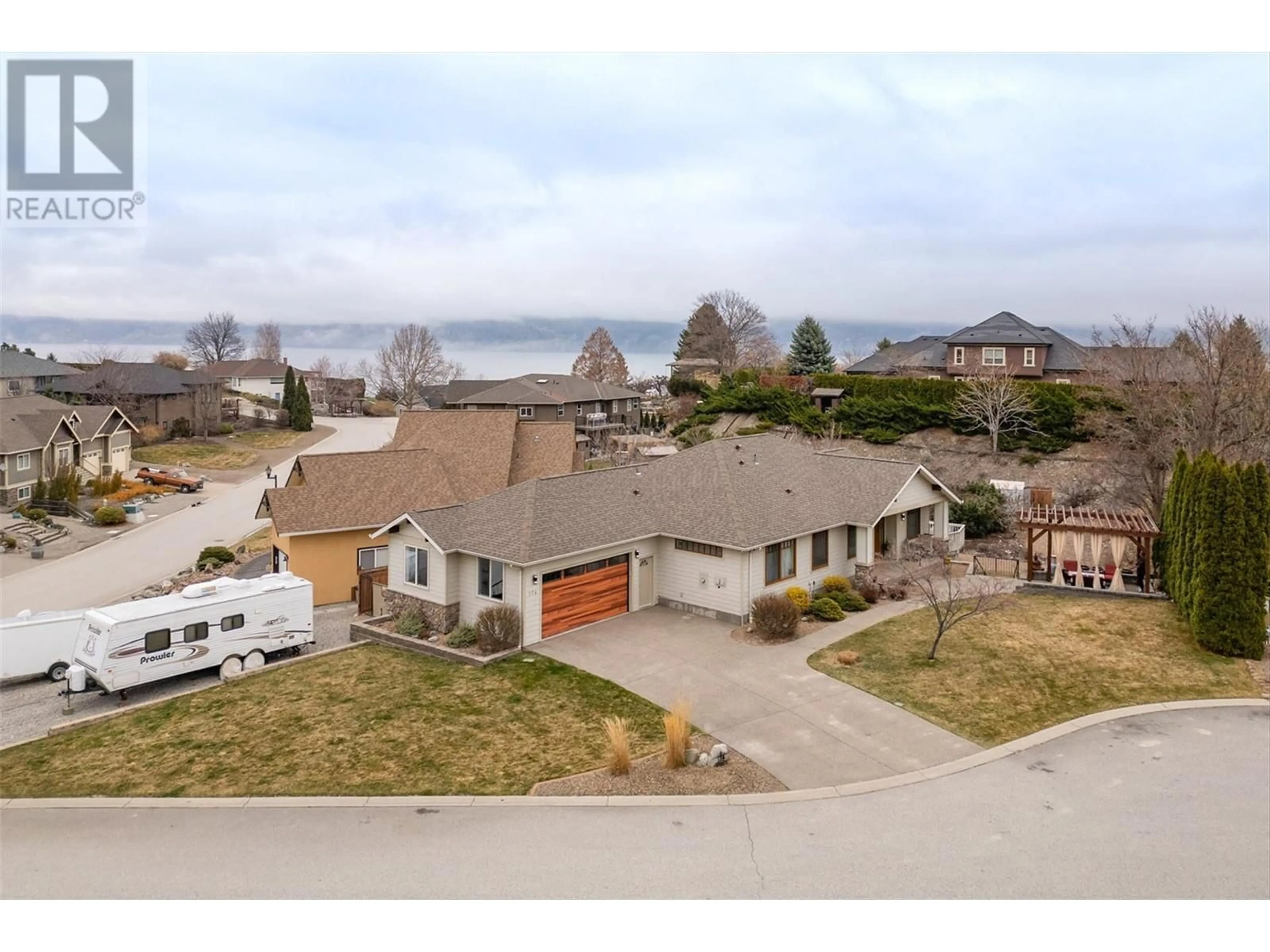 A pic from outside/outdoor area/front of a property/back of a property/a pic from drone, unknown for 174 JEWELL PLACE, Summerland British Columbia V0H1Z4