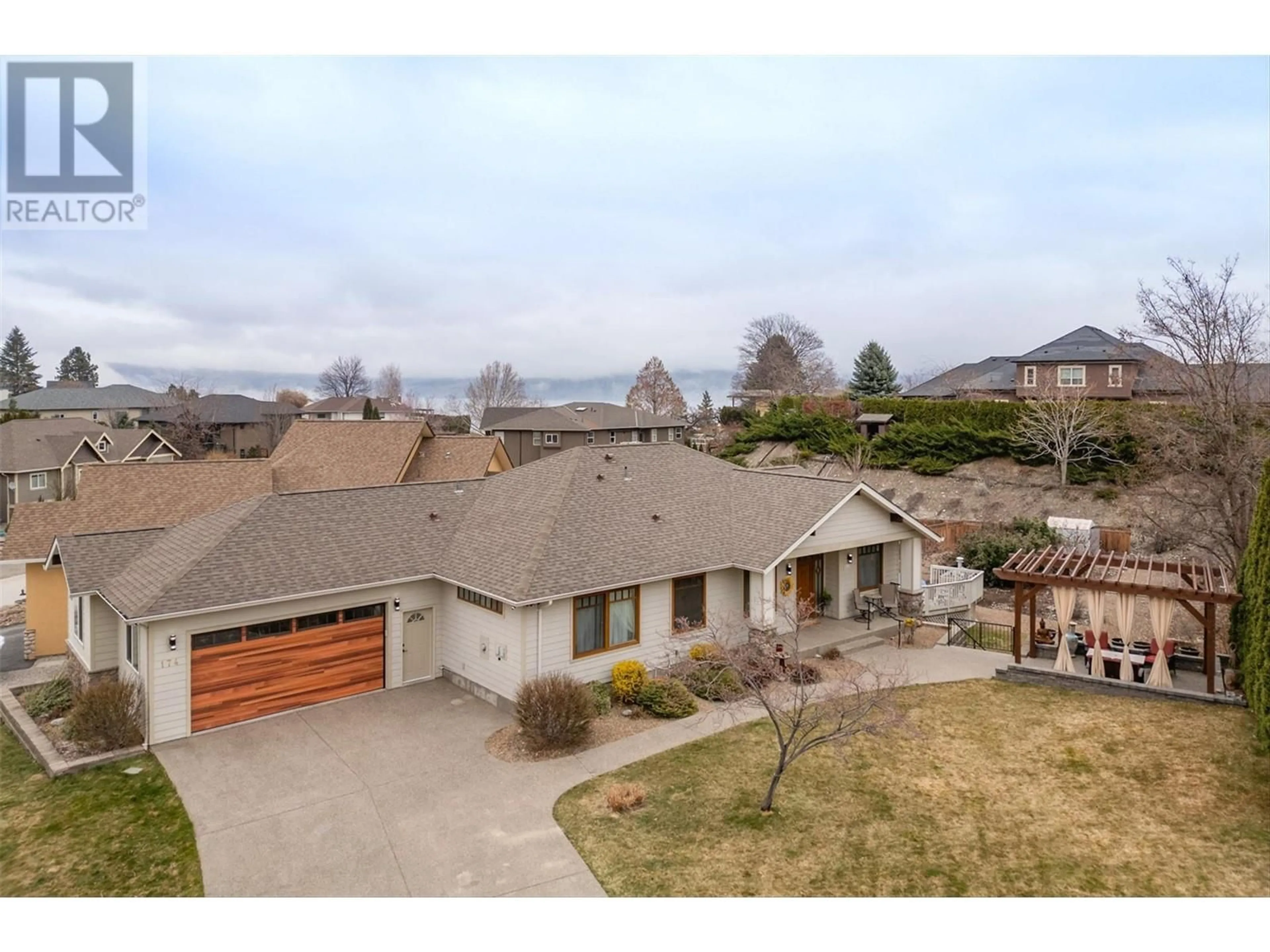A pic from outside/outdoor area/front of a property/back of a property/a pic from drone, unknown for 174 JEWELL PLACE, Summerland British Columbia V0H1Z4