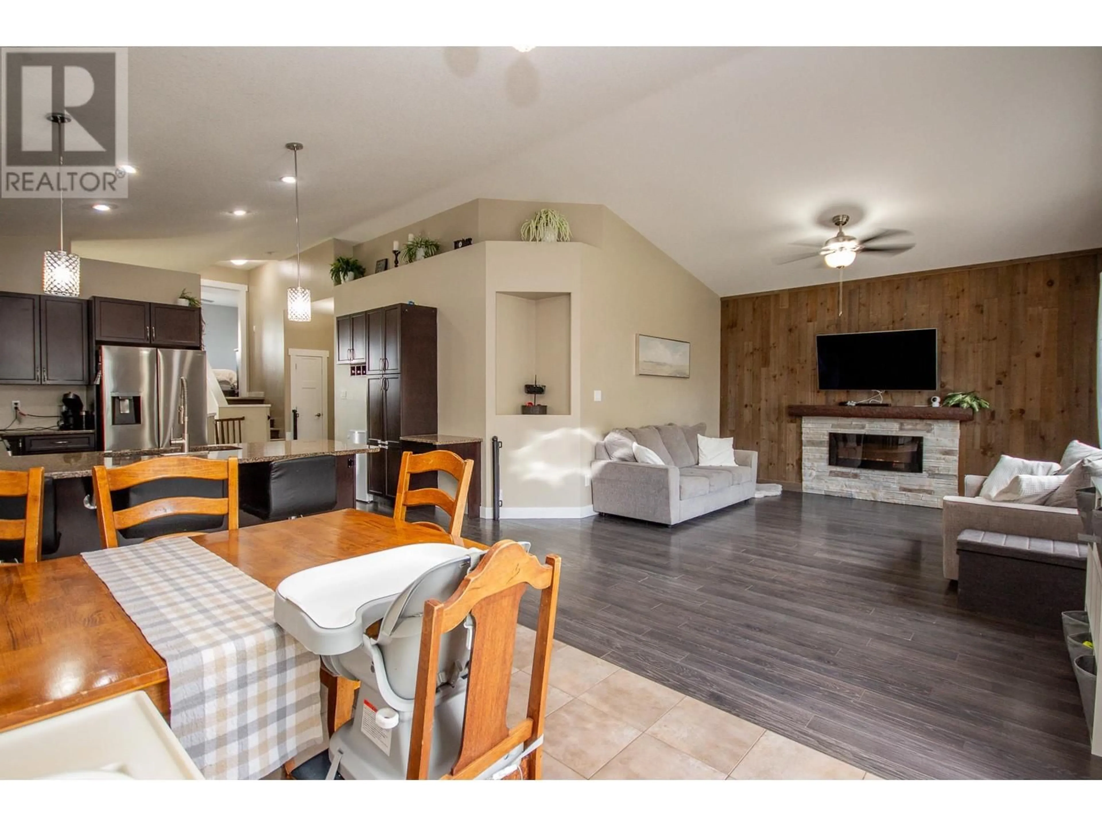 Open concept kitchen, wood/laminate floor for 8412 18A STREET, Dawson Creek British Columbia V1G0E2