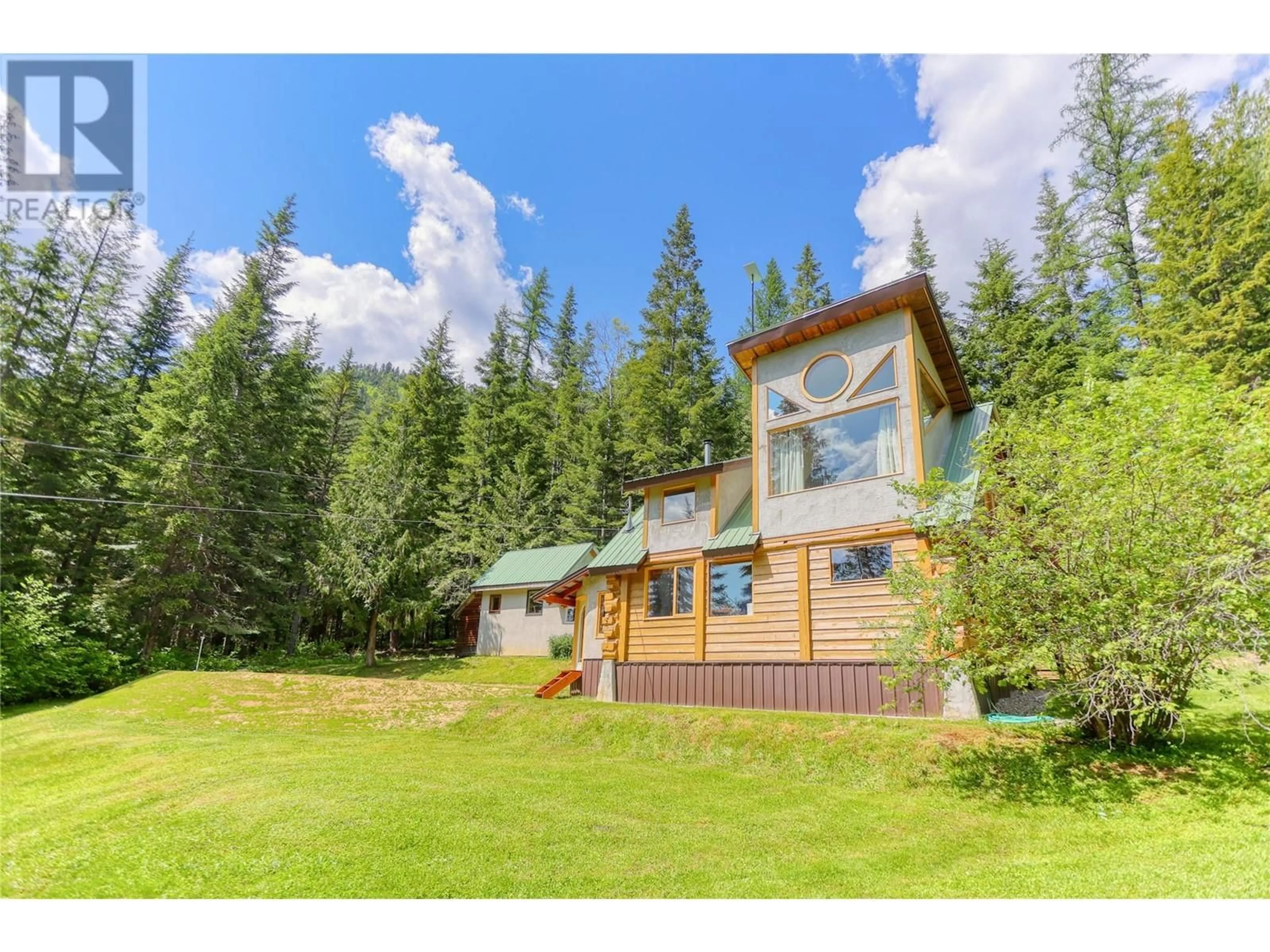 Home with vinyl exterior material, mountain view for 926 WILDHORSE CREEK ROAD, Ymir British Columbia V0G2K0