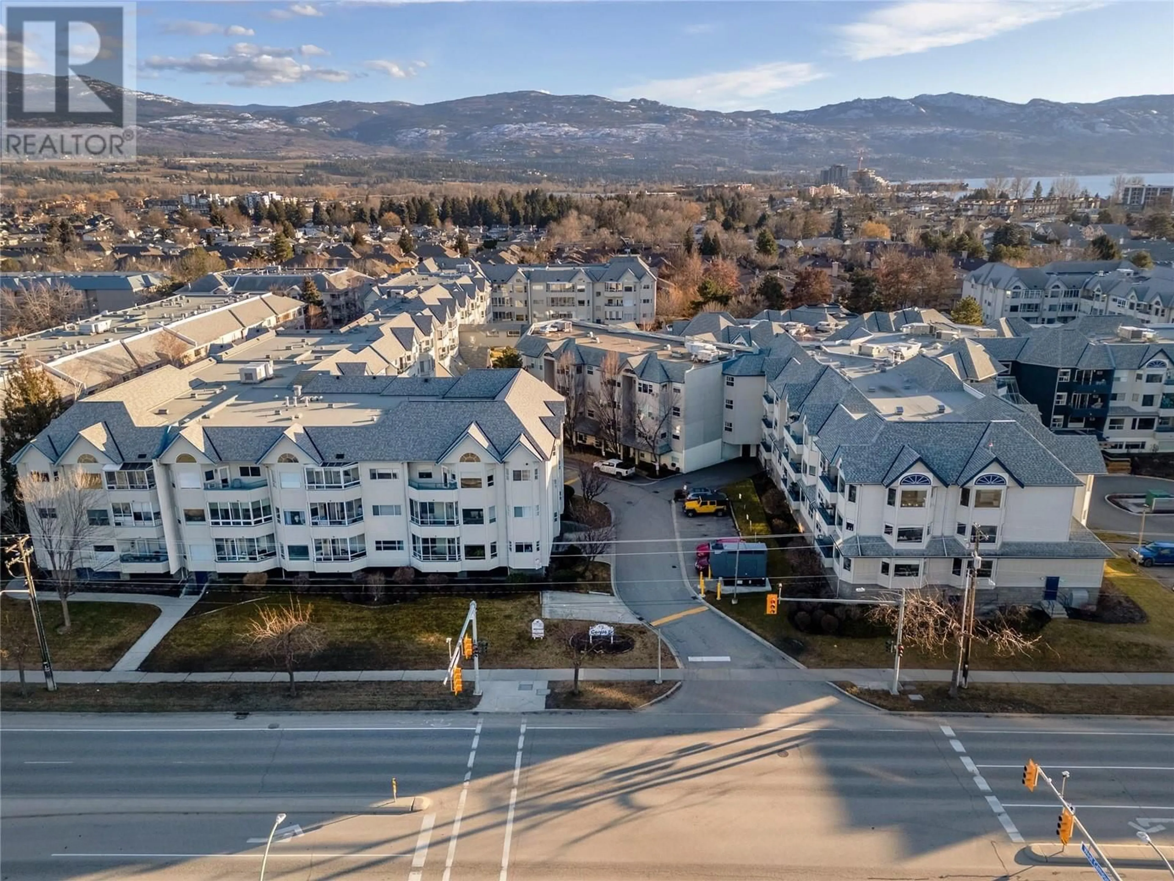 A pic from outside/outdoor area/front of a property/back of a property/a pic from drone, mountain view for 217 - 877 KLO ROAD, Kelowna British Columbia V1Y9R1