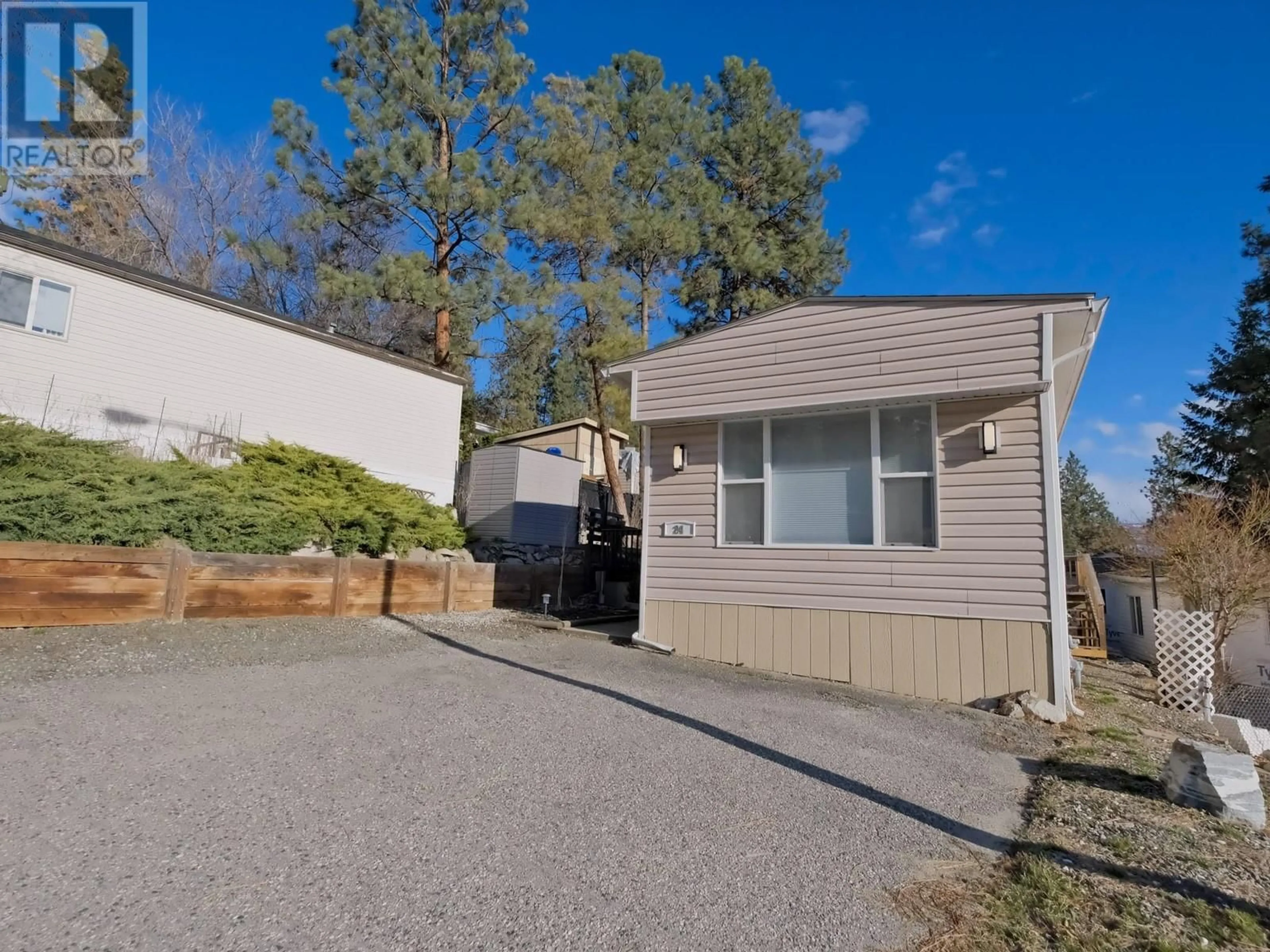 A pic from outside/outdoor area/front of a property/back of a property/a pic from drone, street for 24 - 1860 BOUCHERIE ROAD, West Kelowna British Columbia V4T1Z9