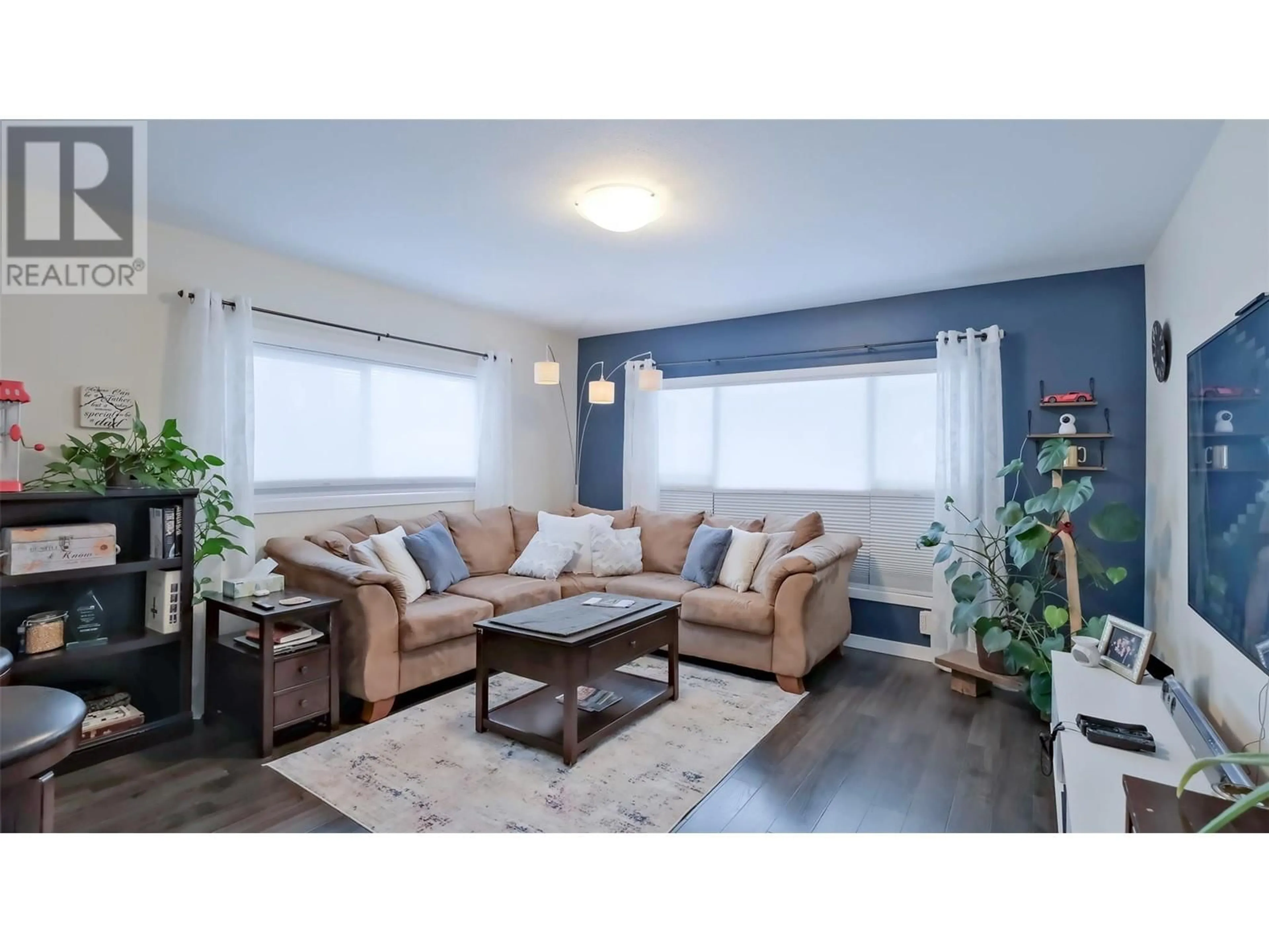 Living room with furniture, wood/laminate floor for 24 - 1860 BOUCHERIE ROAD, West Kelowna British Columbia V4T1Z9
