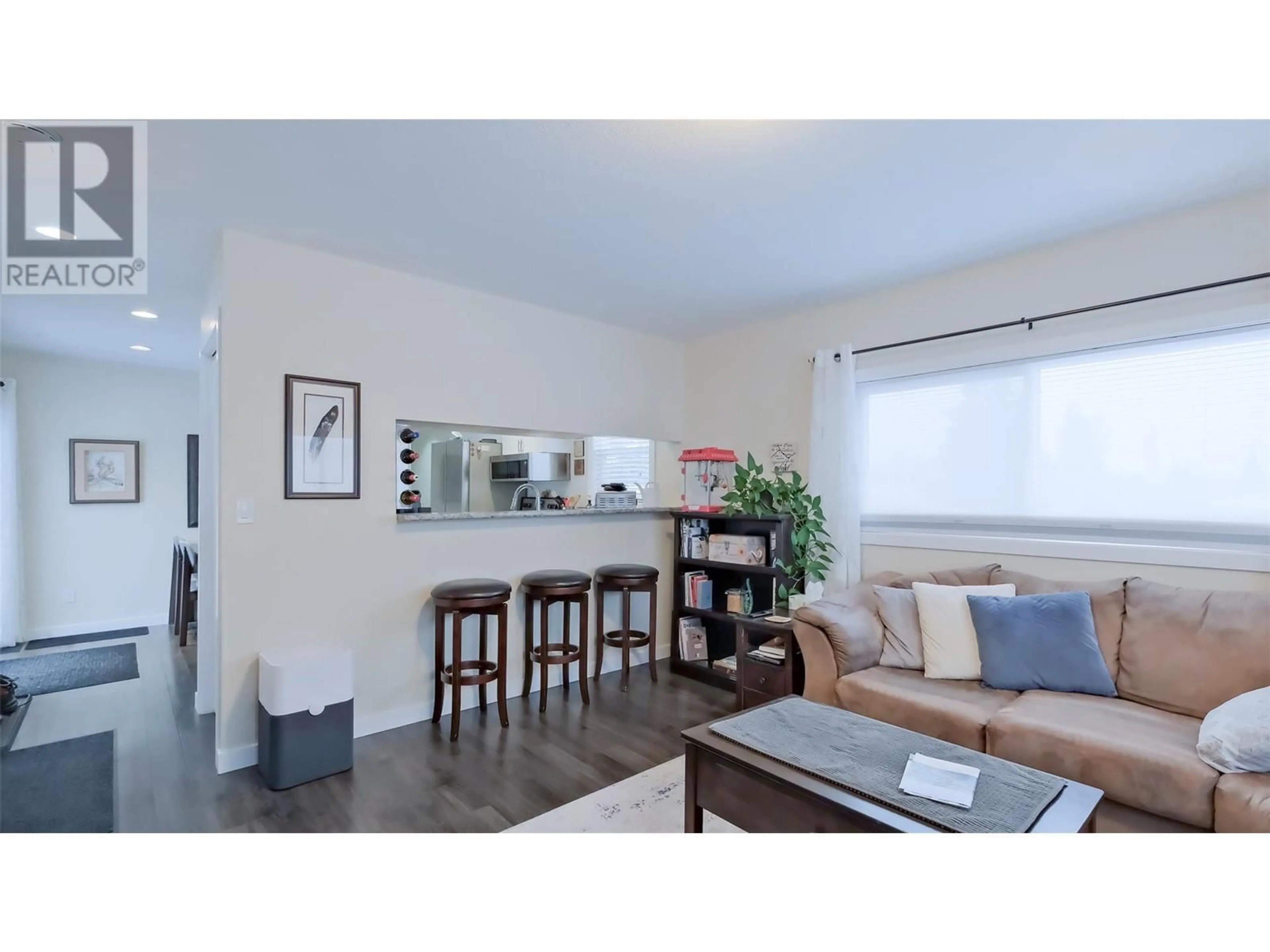 Living room with furniture, wood/laminate floor for 24 - 1860 BOUCHERIE ROAD, West Kelowna British Columbia V4T1Z9