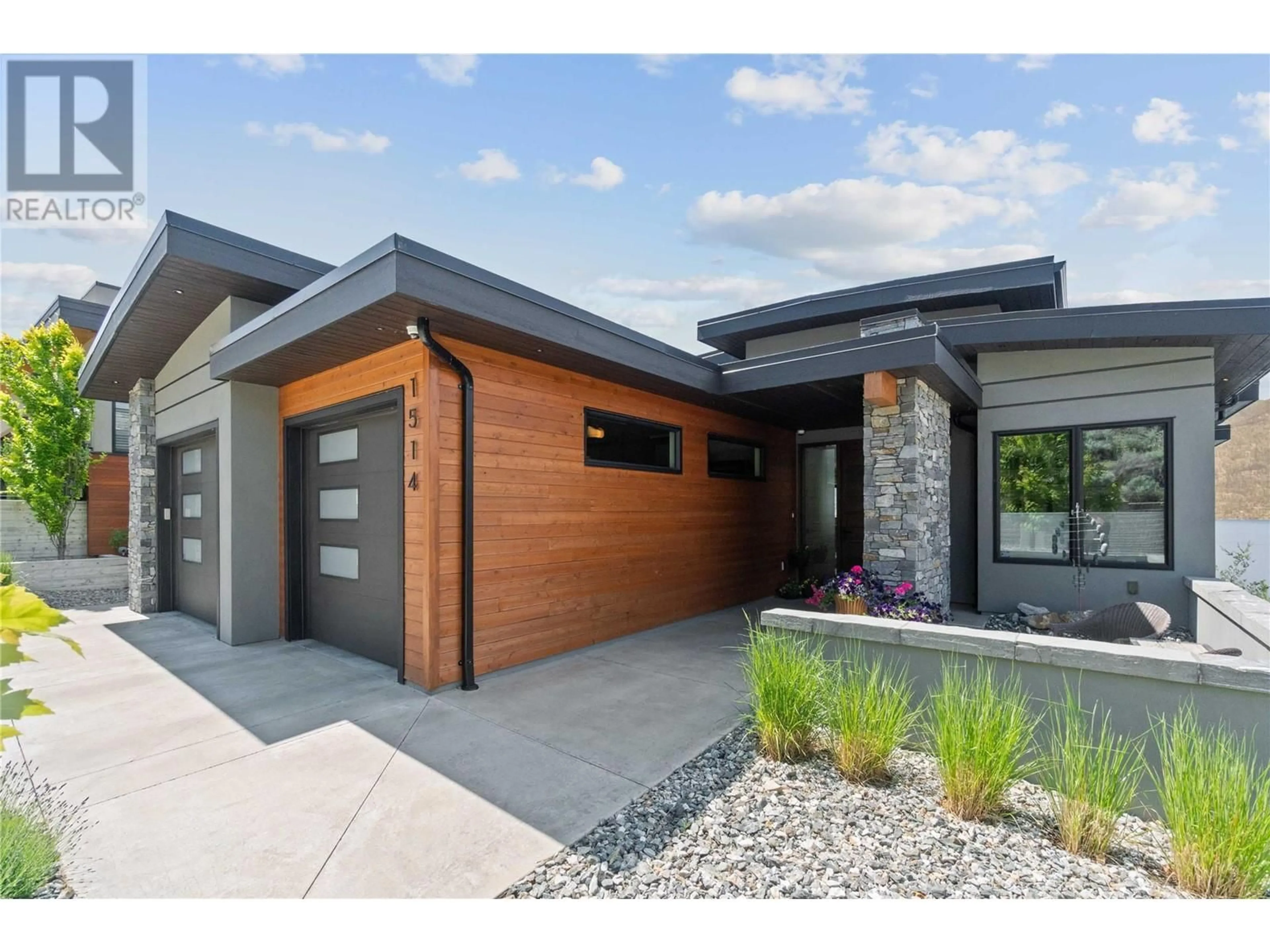 Home with brick exterior material, street for 1514 MARBLE LEDGE DRIVE, Lake Country British Columbia V4V2T4