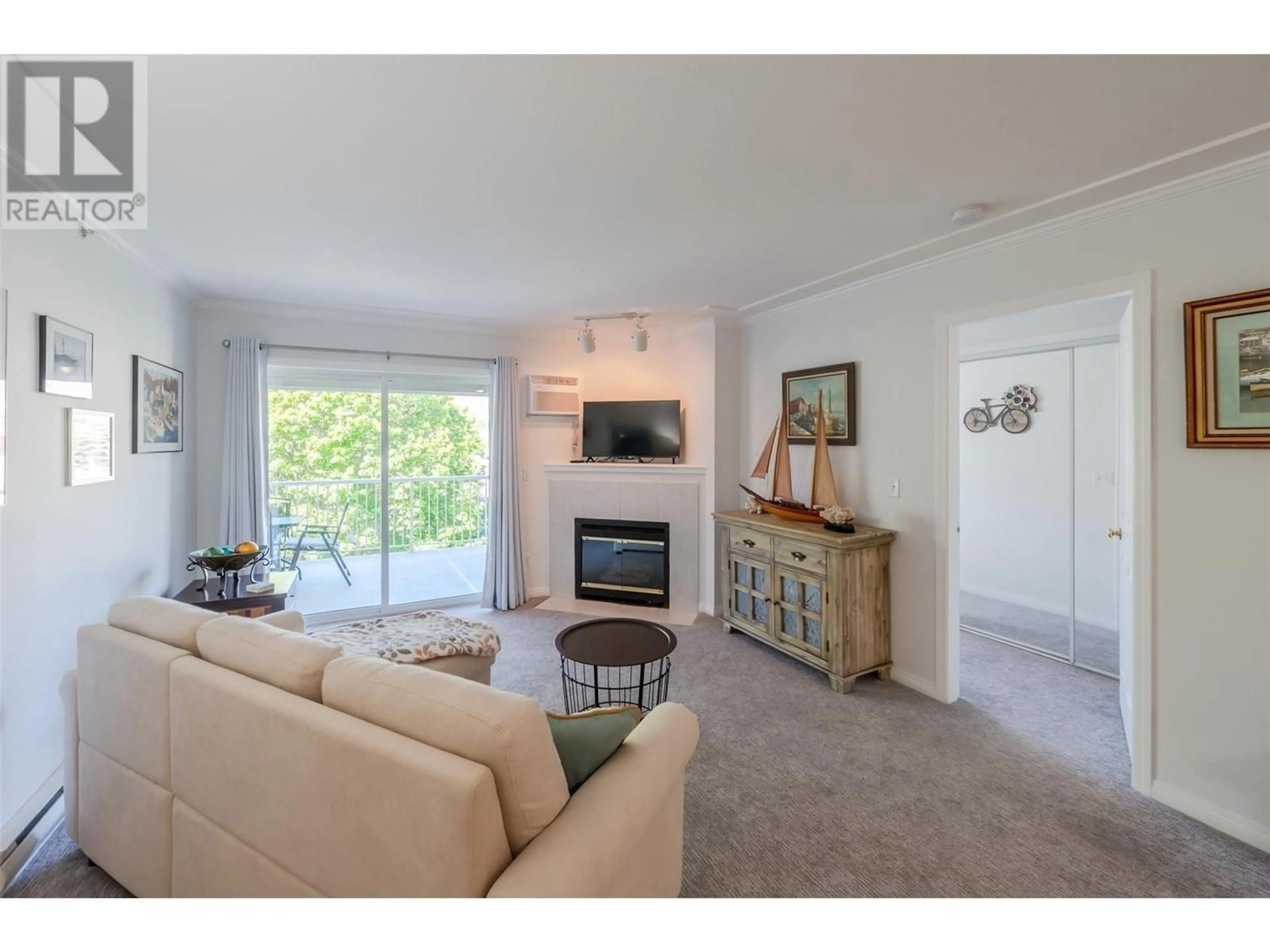 Living room with furniture, unknown for 406 - 329 RIGSBY STREET, Penticton British Columbia V2A5S6