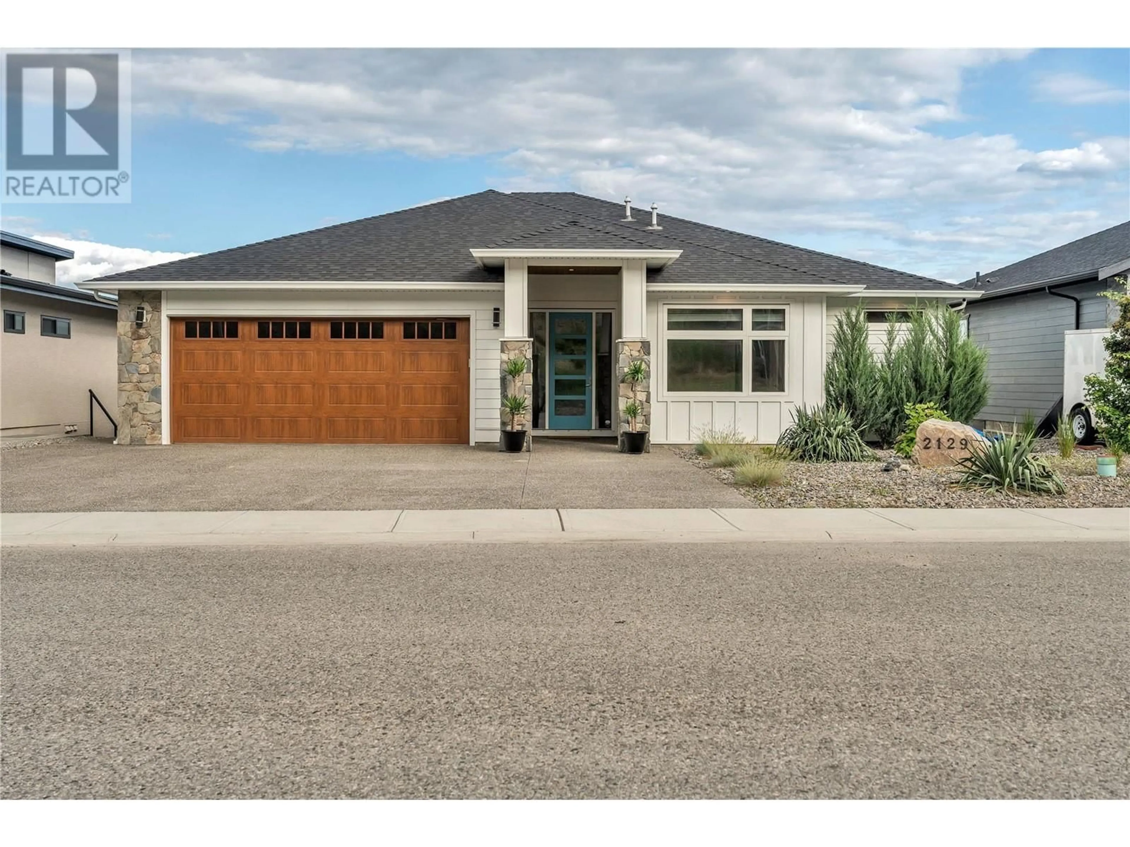 Home with brick exterior material, street for 2129 ENSIGN QUAY, West Kelowna British Columbia V4T1V1
