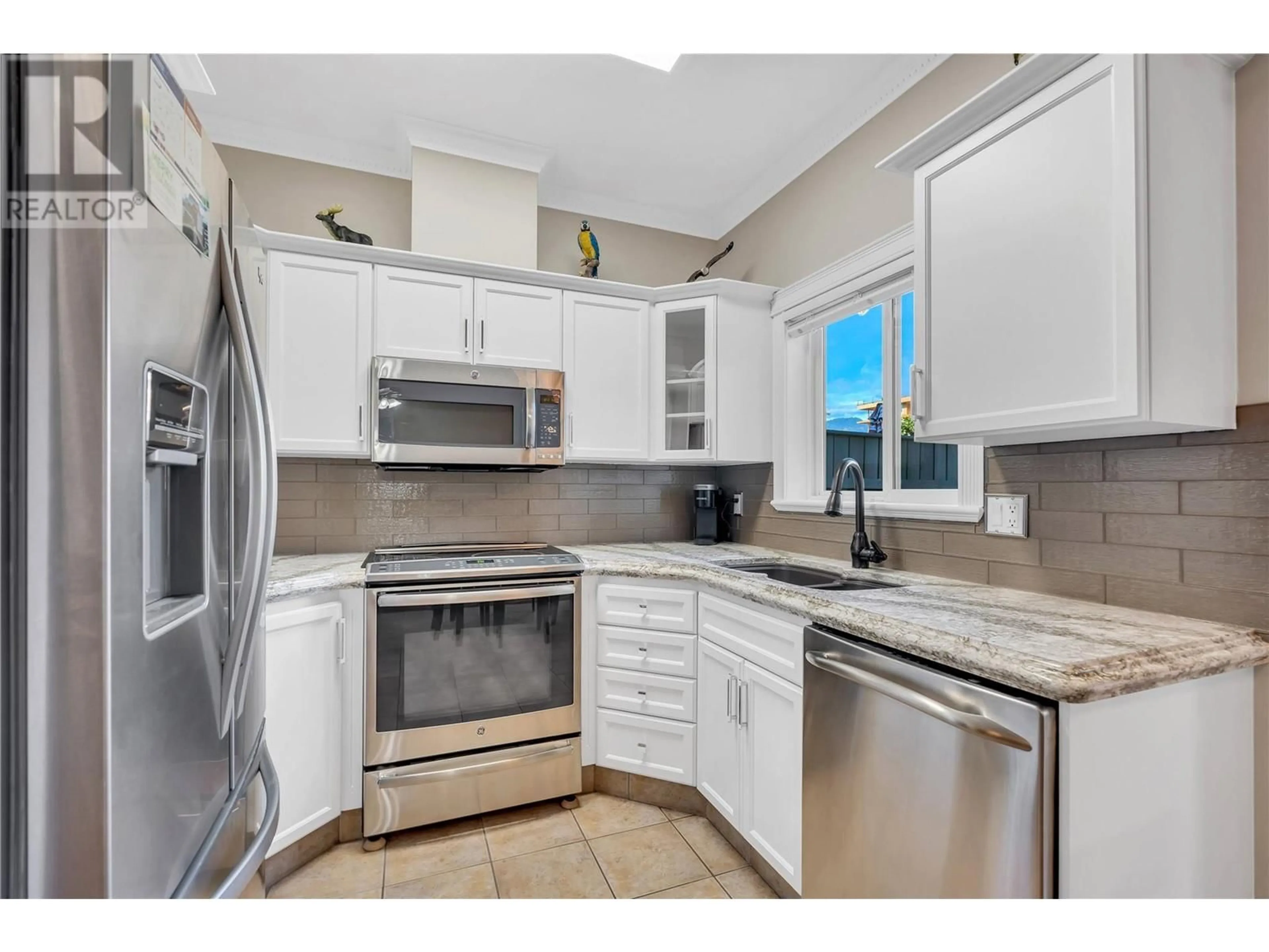 Standard kitchen, ceramic/tile floor for 102 - 1078 BURNABY AVENUE, Penticton British Columbia V2A1G8