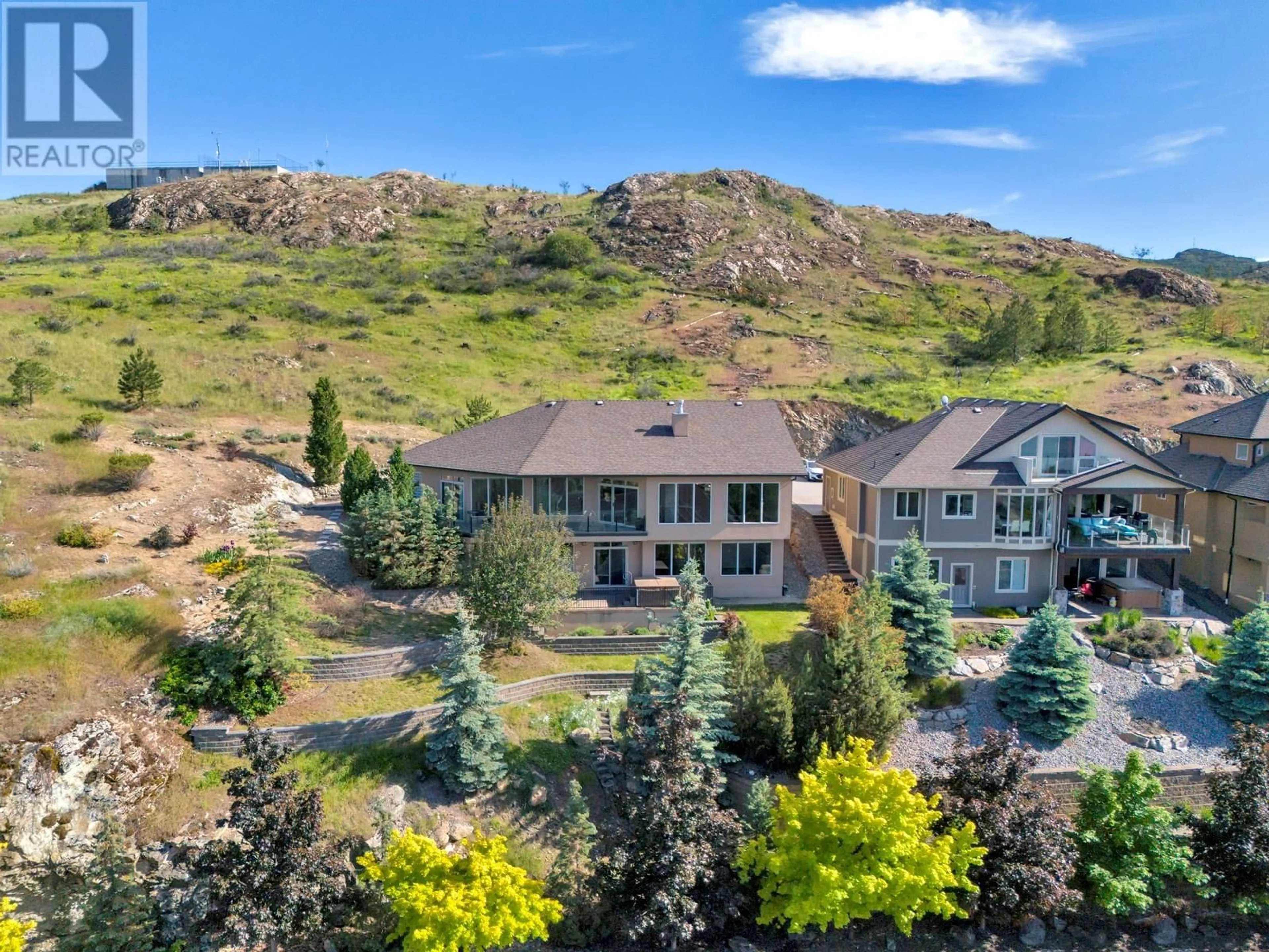 A pic from outside/outdoor area/front of a property/back of a property/a pic from drone, mountain view for 764 KUIPERS CRESCENT, Kelowna British Columbia V1W5C9
