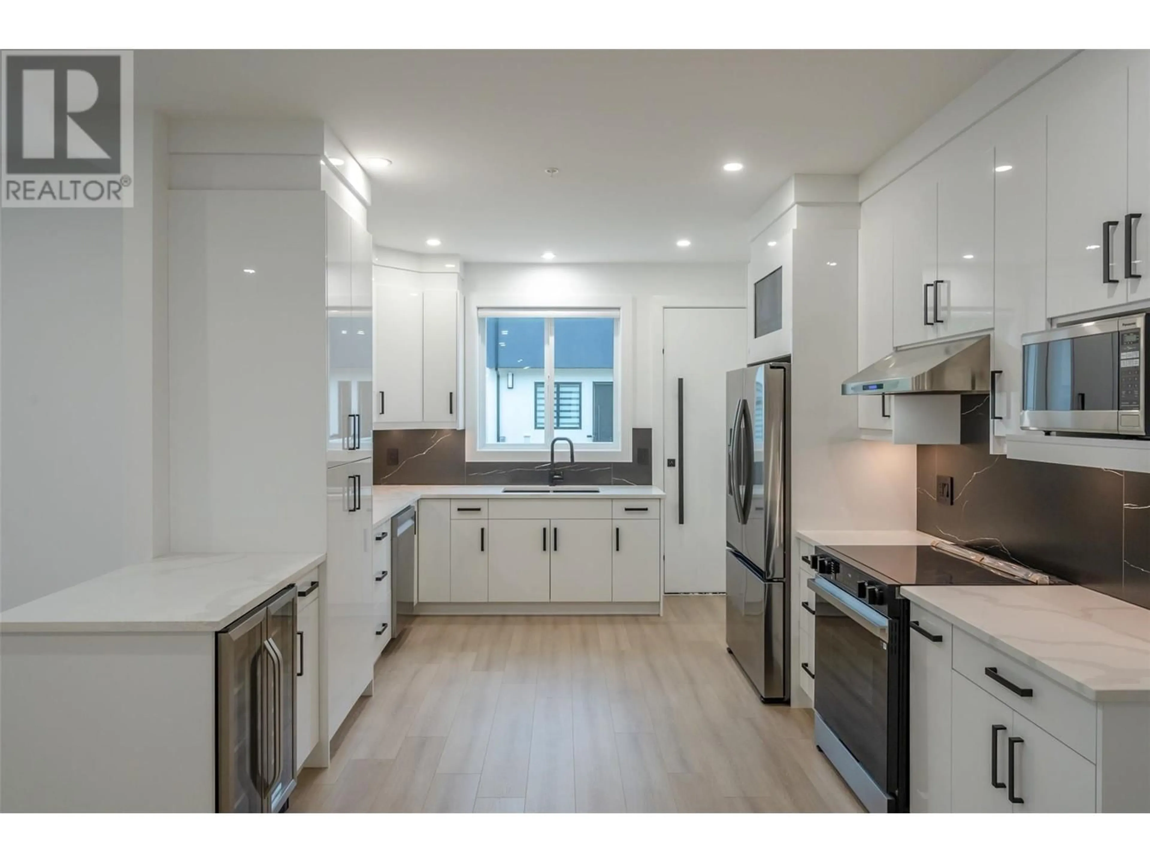 Open concept kitchen, unknown for 103 - 60 ROY AVENUE, Penticton British Columbia V2A3M7