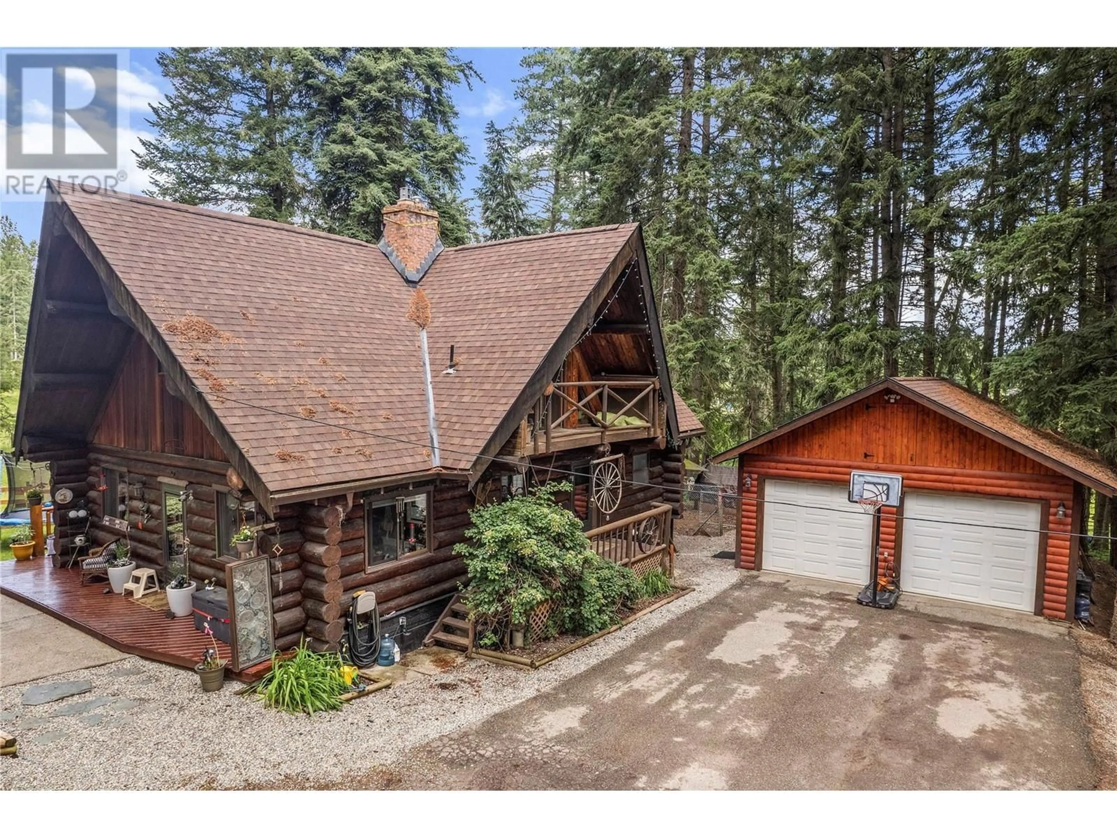 A pic from outside/outdoor area/front of a property/back of a property/a pic from drone, mountain view for 461 HIGHWAY 97B OTHER SOUTHEAST, Salmon Arm British Columbia V1E1X5