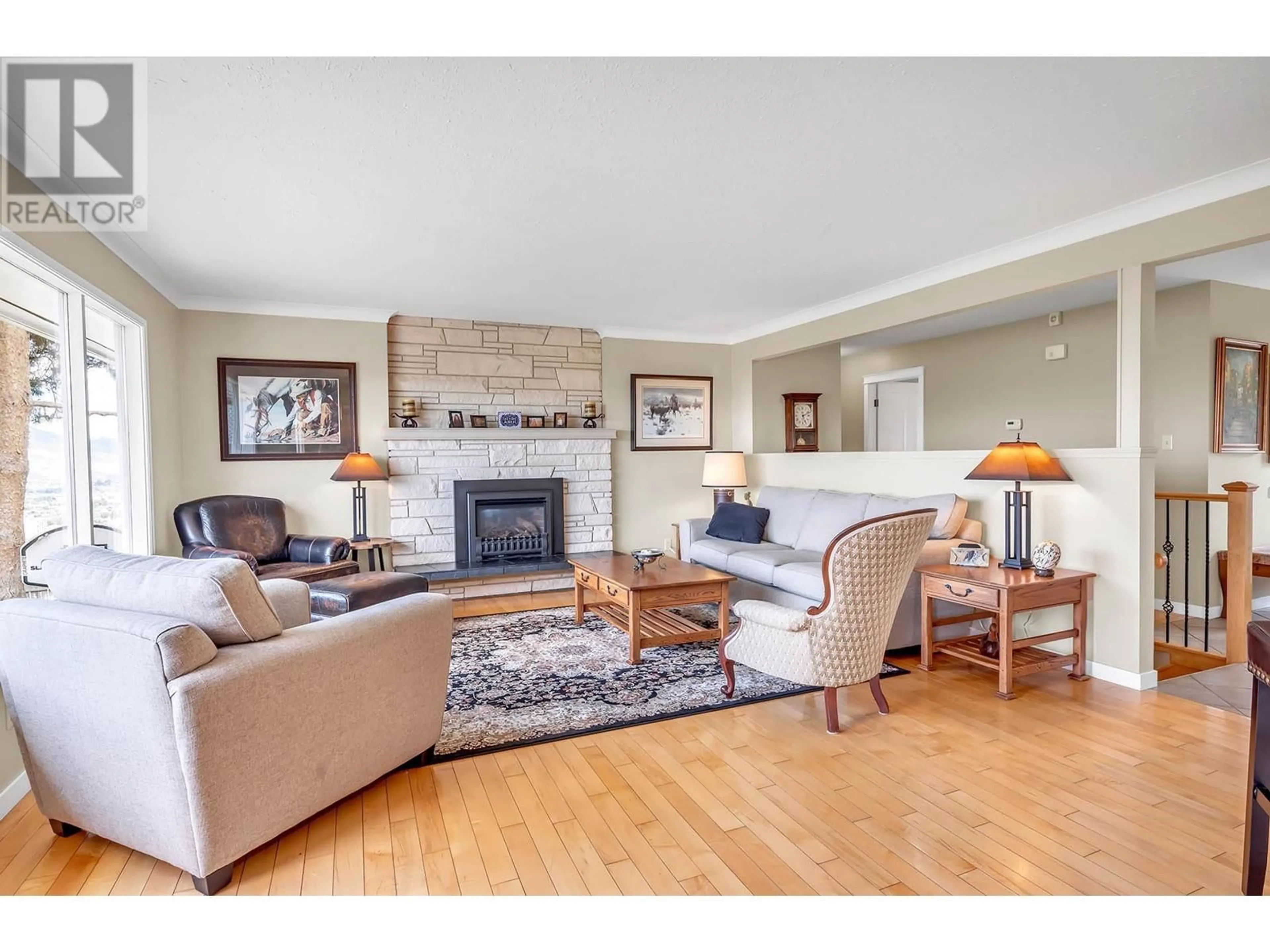 Living room with furniture, wood/laminate floor for 218 BESTWICK DRIVE, Kamloops British Columbia V2C1M9