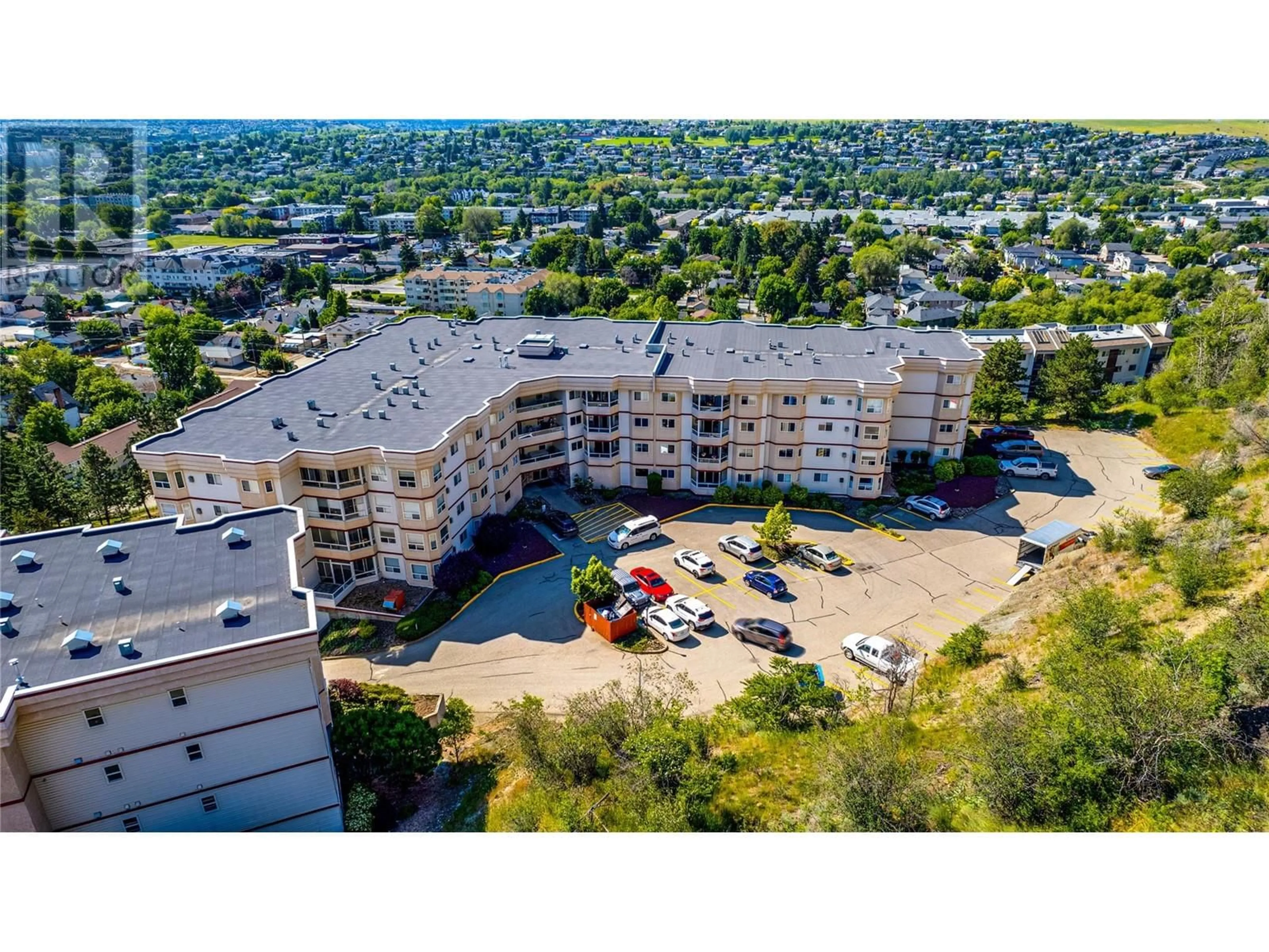A pic from outside/outdoor area/front of a property/back of a property/a pic from drone, unknown for 407 - 3806 35 AVENUE, Vernon British Columbia V1T9N6