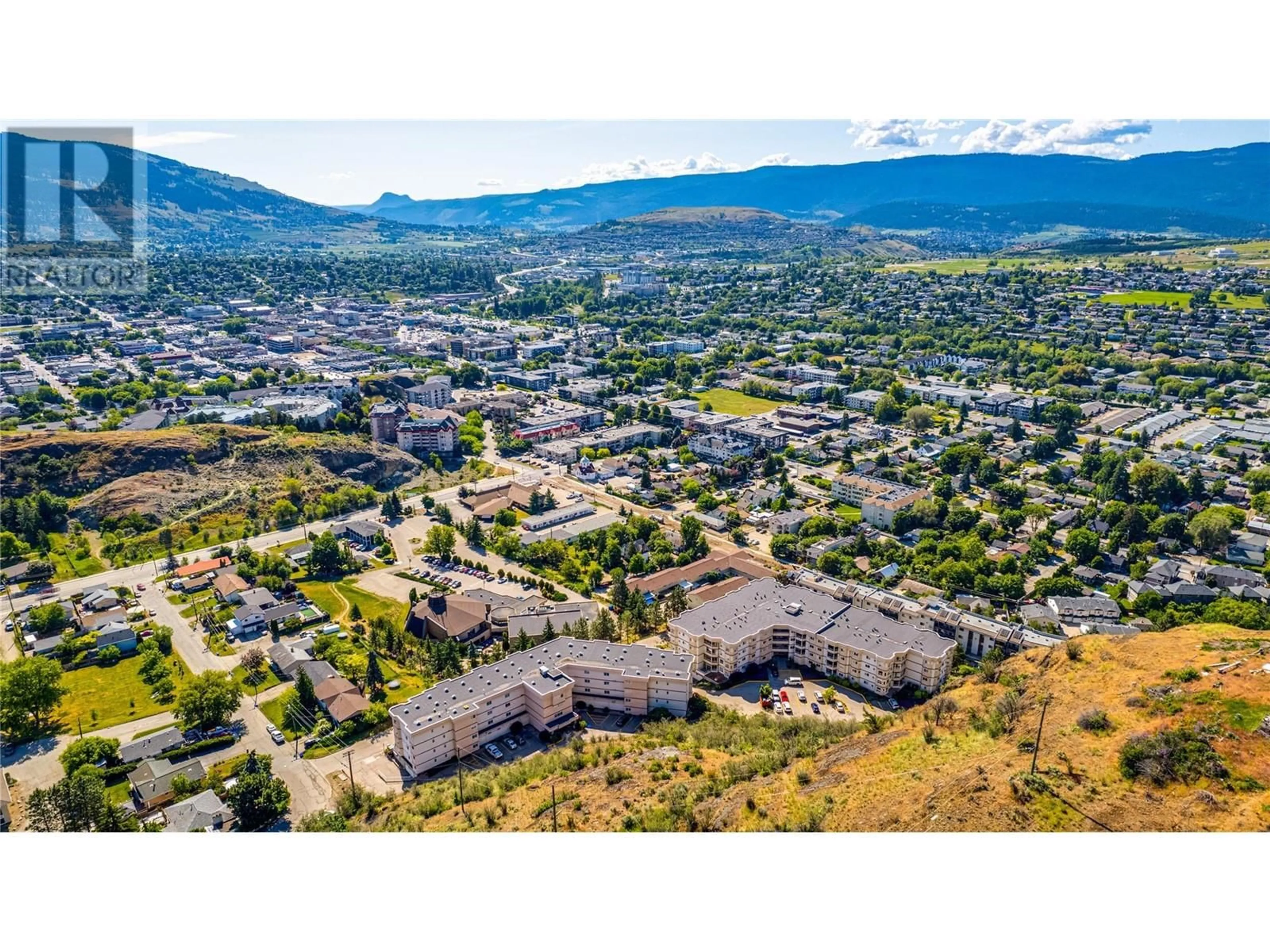 A pic from outside/outdoor area/front of a property/back of a property/a pic from drone, mountain view for 407 - 3806 35 AVENUE, Vernon British Columbia V1T9N6