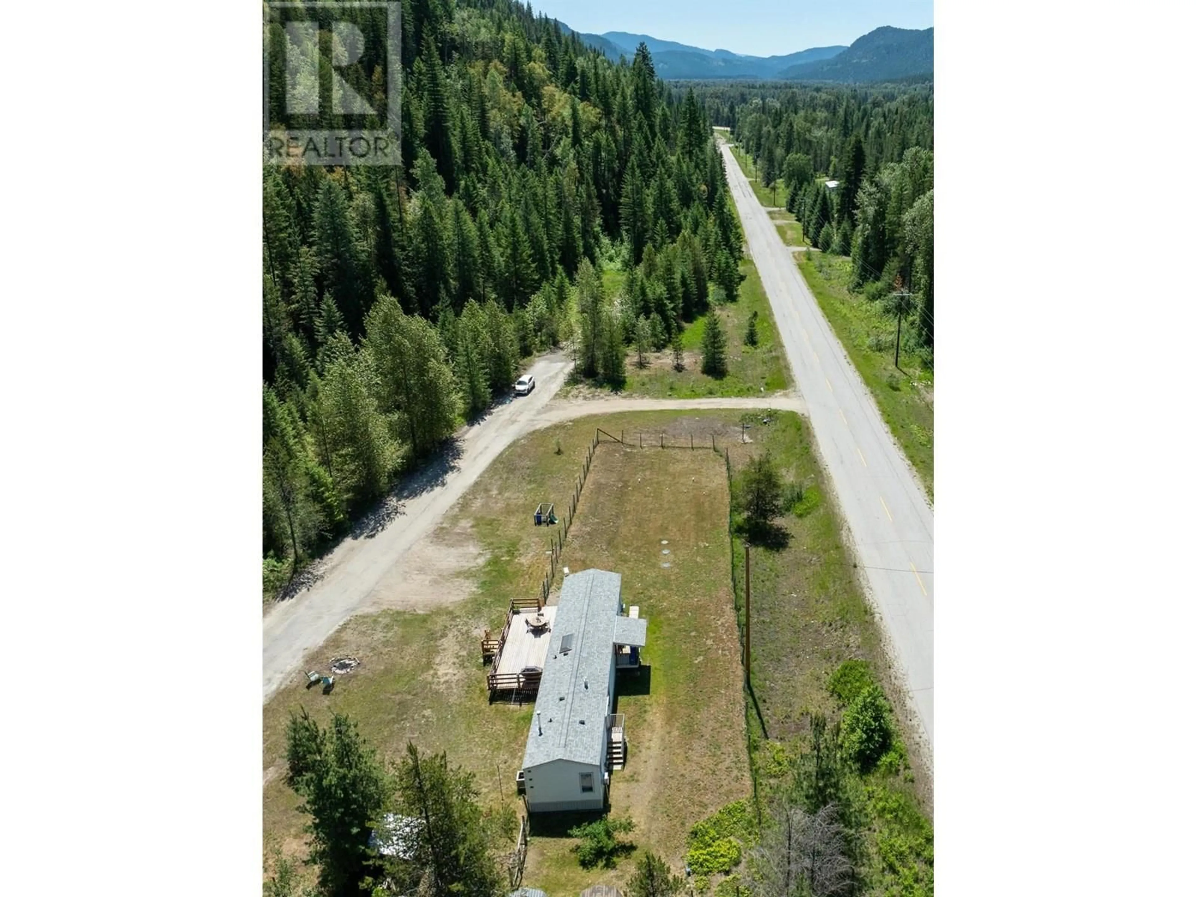 A pic from outside/outdoor area/front of a property/back of a property/a pic from drone, forest/trees view for 1905 AIRPORT ROAD, Salmo British Columbia V0G1Z0