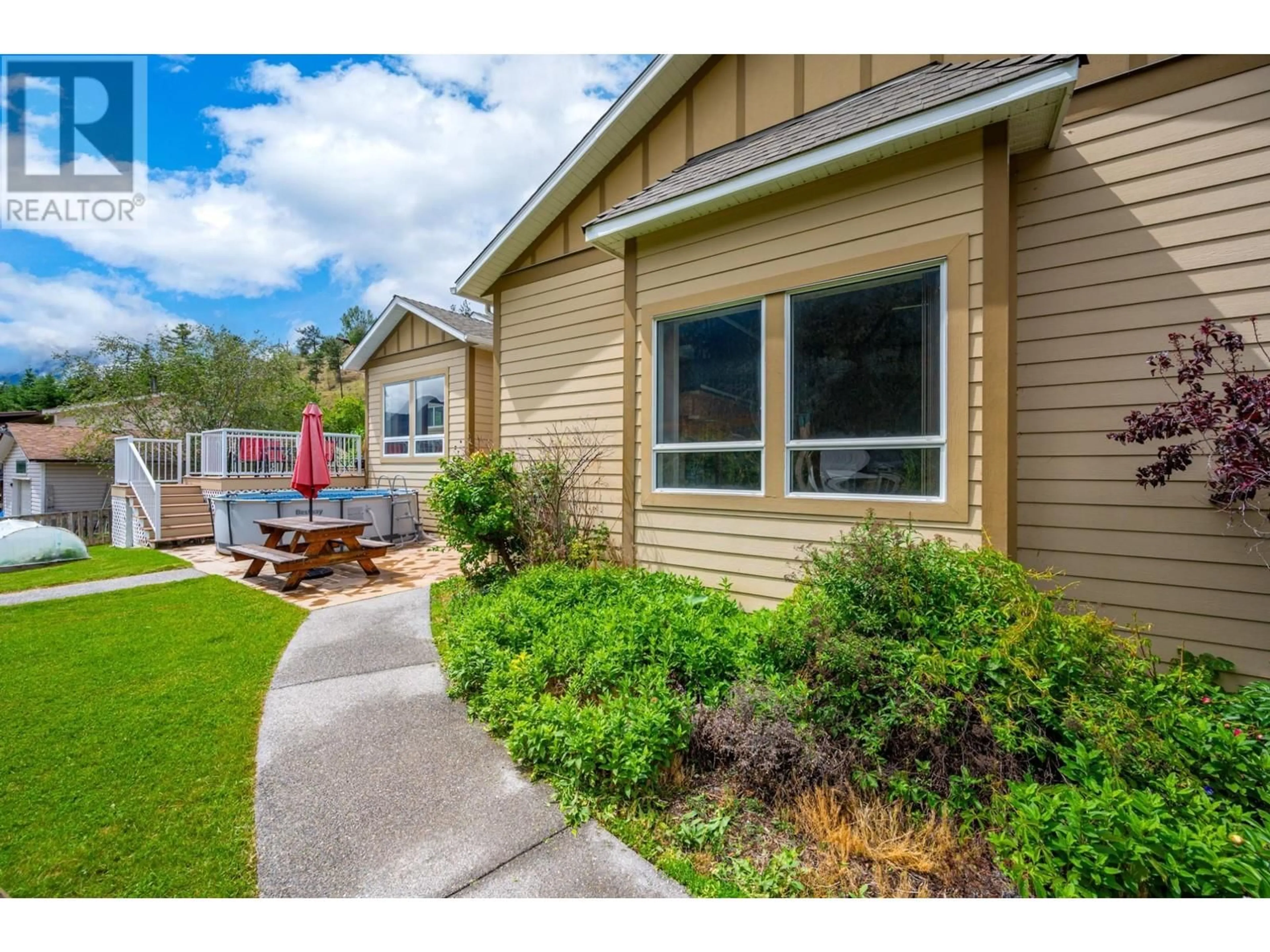 Home with vinyl exterior material, street for 181 HOMESTEAD ROAD, Lillooet British Columbia V0K1V0