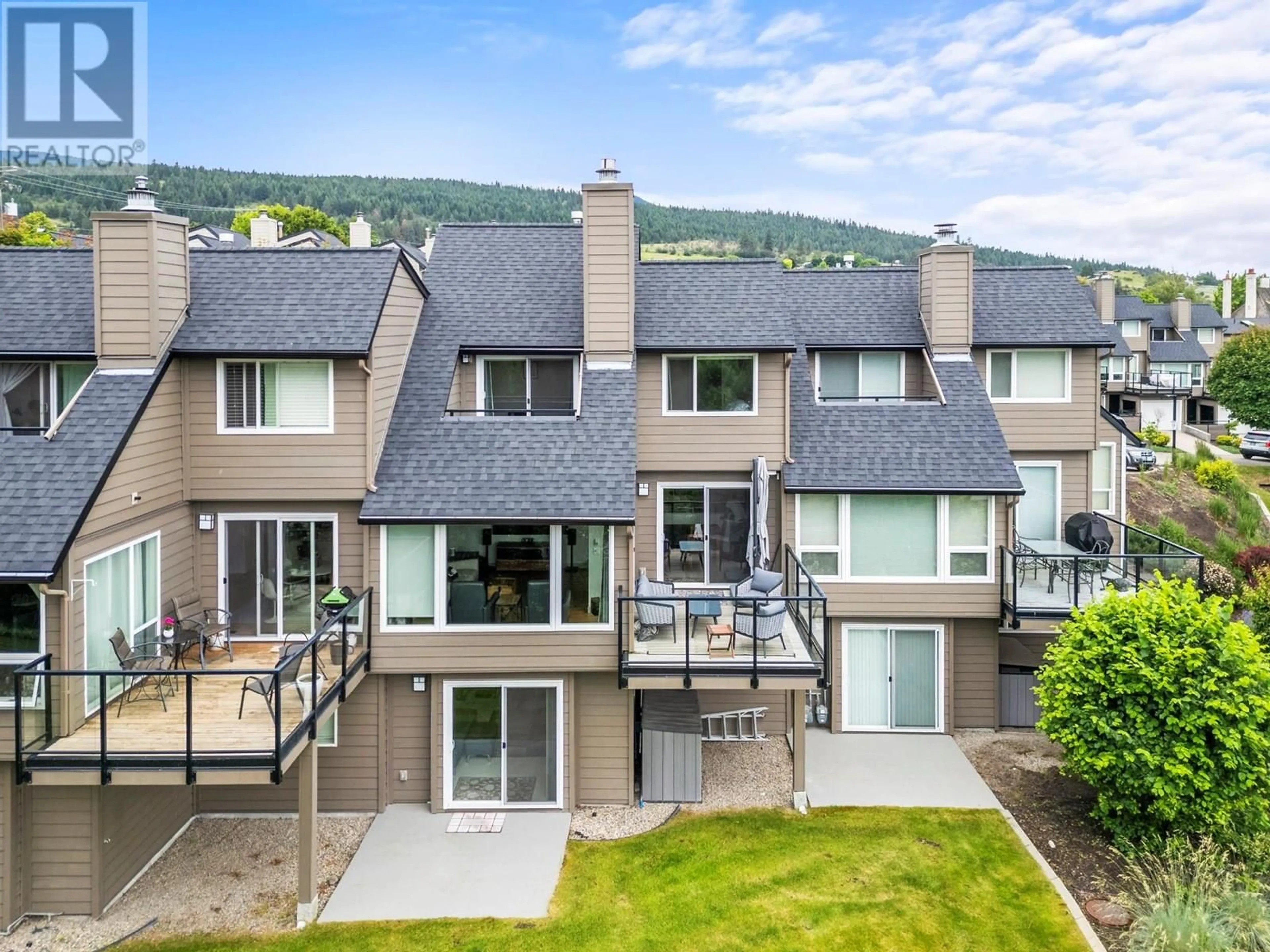 A pic from outside/outdoor area/front of a property/back of a property/a pic from drone, mountain view for 5 - 7880 KIDSTON ROAD, Coldstream British Columbia V1B1S2