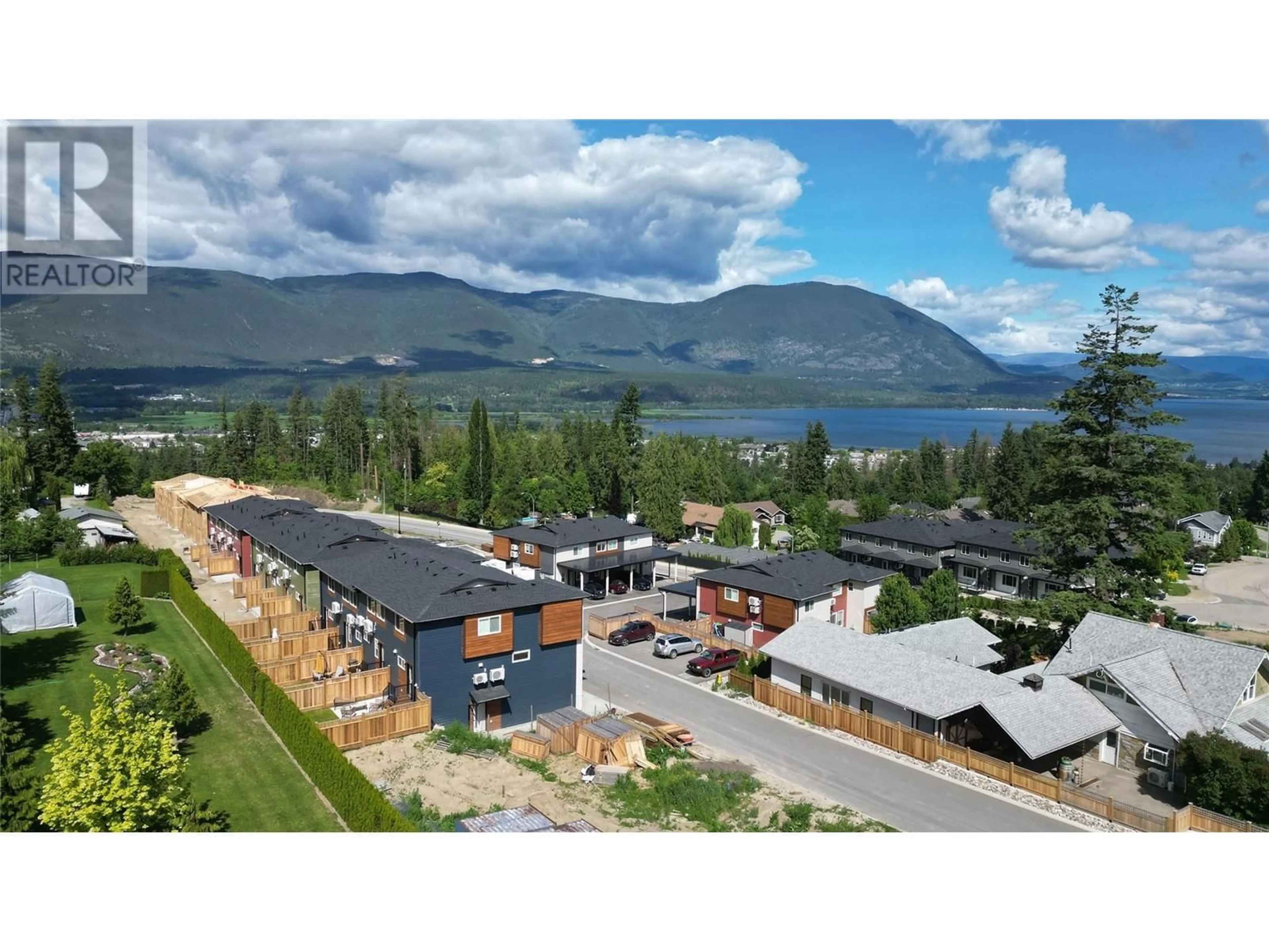 A pic from outside/outdoor area/front of a property/back of a property/a pic from drone, mountain view for 31 - 981 12 STREET SOUTHEAST, Salmon Arm British Columbia V1E2C8