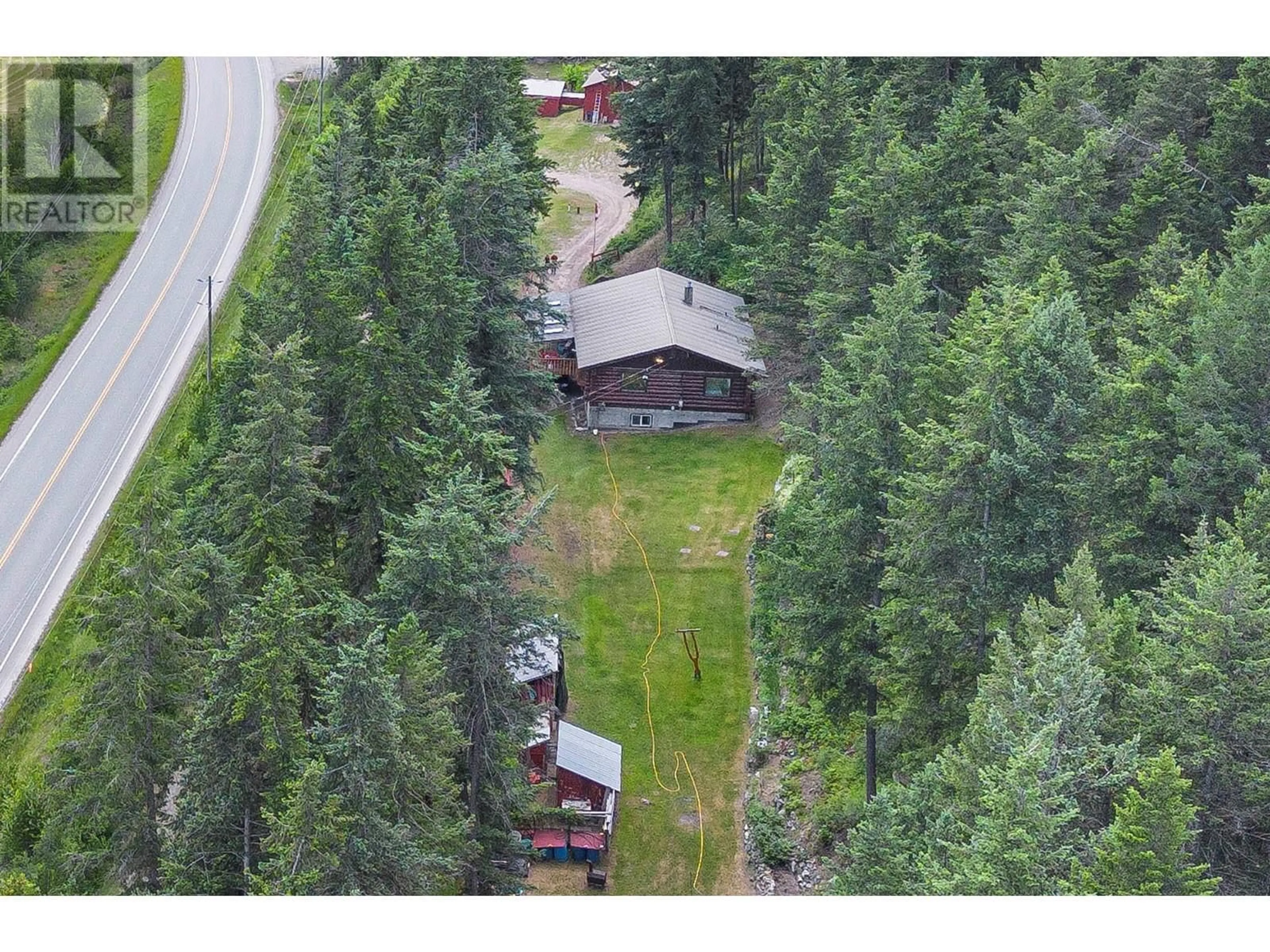 A pic from outside/outdoor area/front of a property/back of a property/a pic from drone, forest/trees view for 8489 YELLOWHEAD HIGHWAY, Little Fort British Columbia V0E1R0