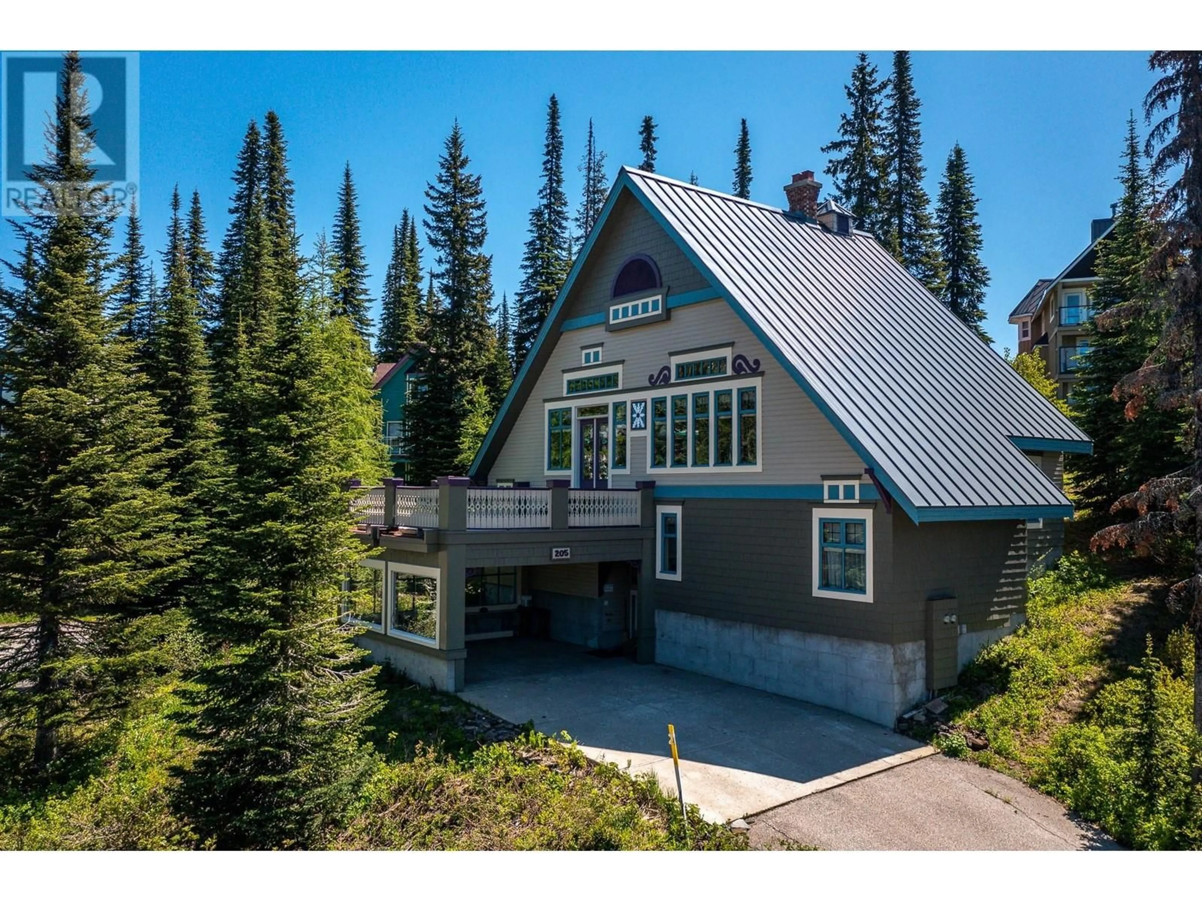 A pic from outside/outdoor area/front of a property/back of a property/a pic from drone, mountain view for 205 MONASHEE ROAD, Silver Star British Columbia V1B3M1