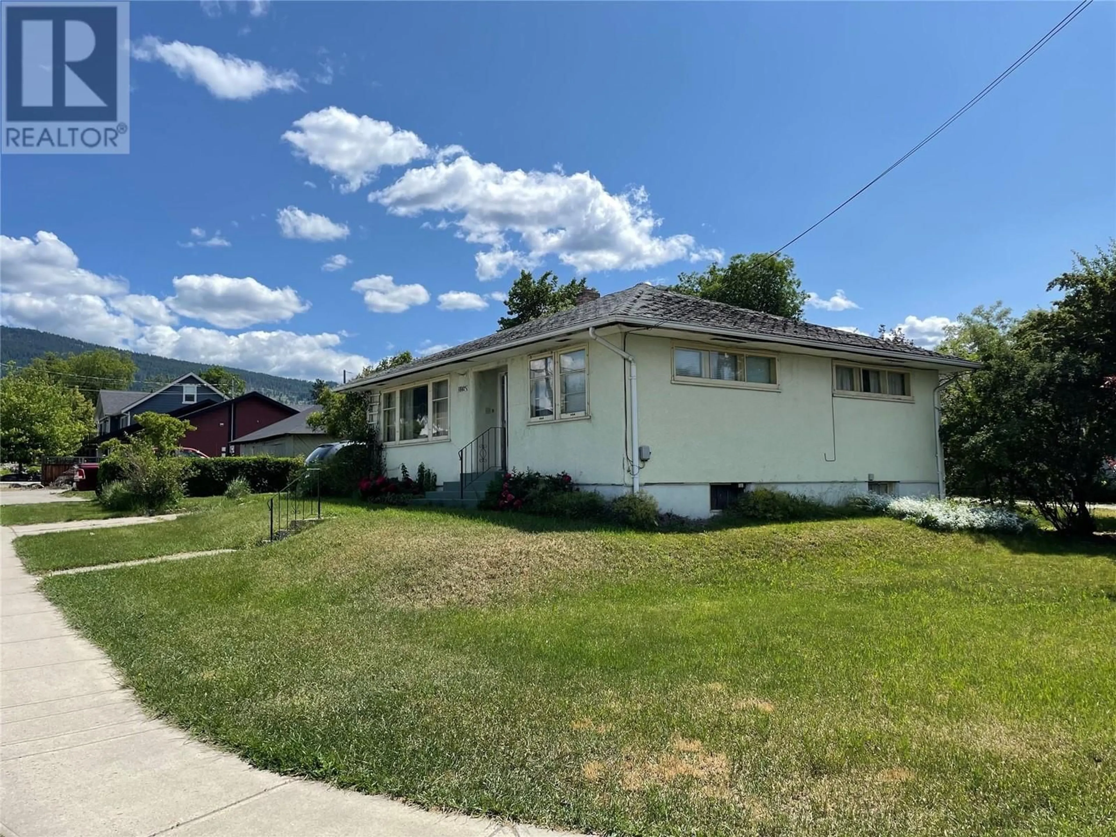 A pic from outside/outdoor area/front of a property/back of a property/a pic from drone, street for 1802 35 AVENUE, Vernon British Columbia V1T2R8