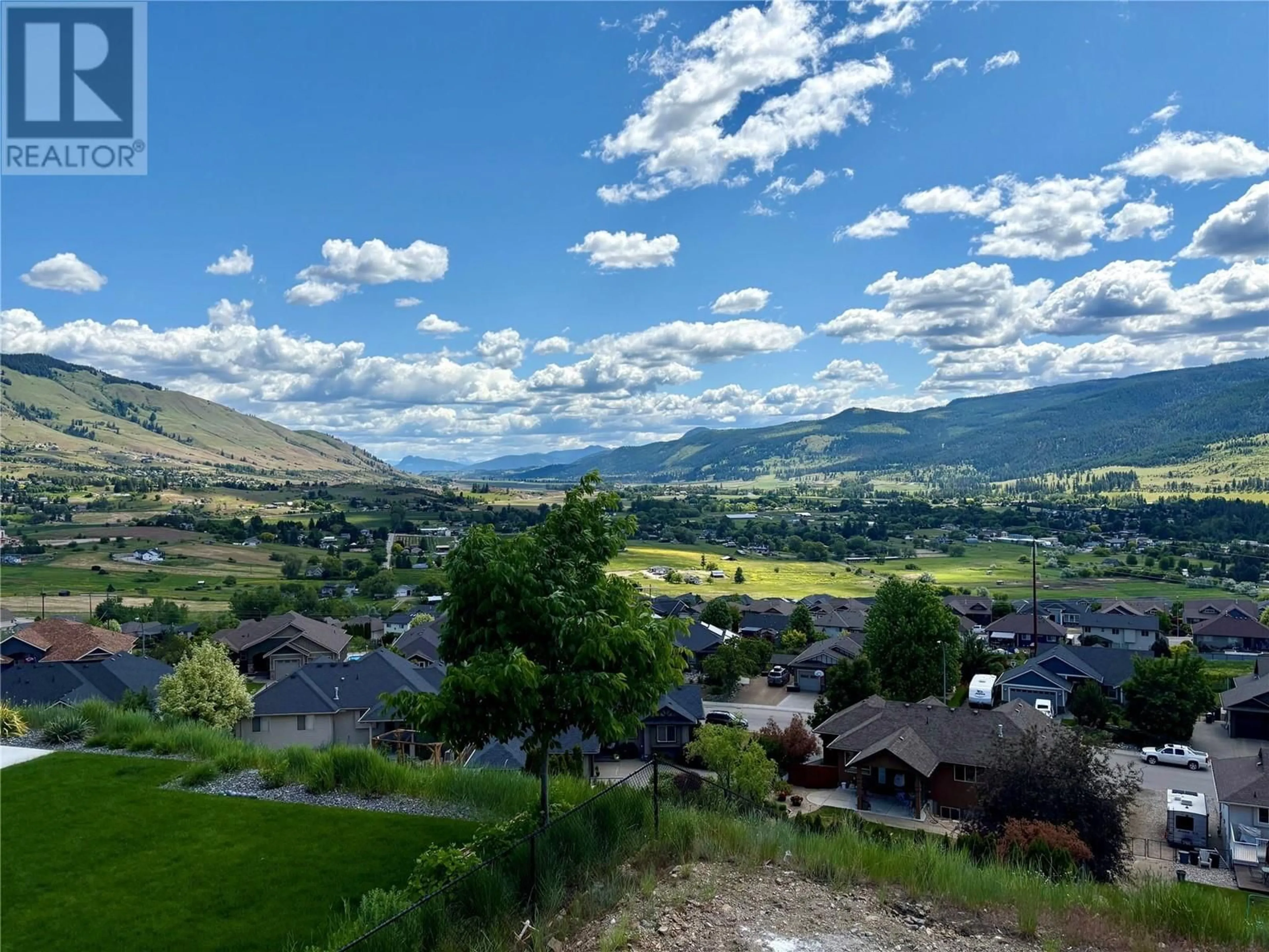 A pic from outside/outdoor area/front of a property/back of a property/a pic from drone, mountain view for 592 MT IDA CRESCENT, Coldstream British Columbia V1B4G3