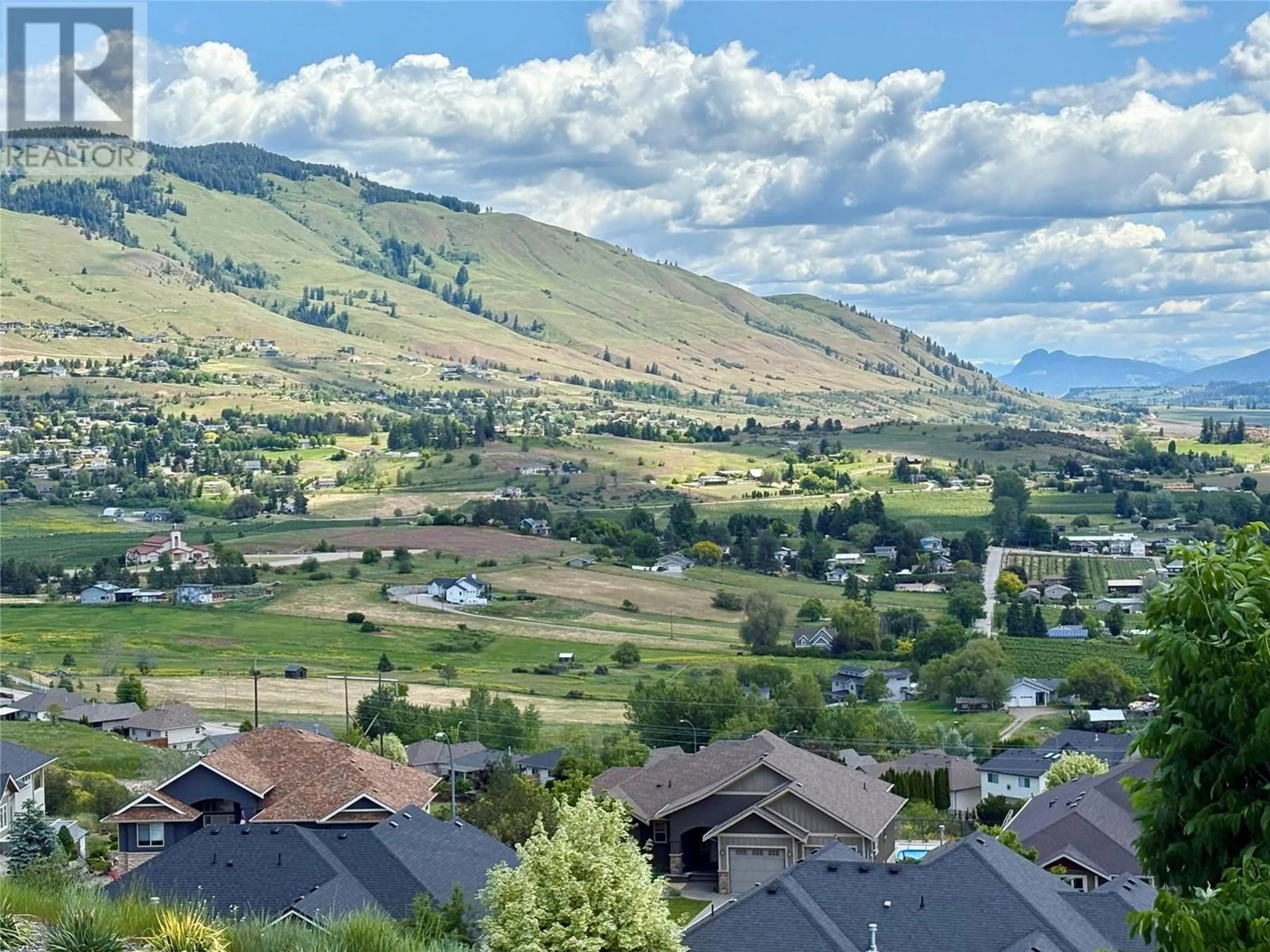 A pic from outside/outdoor area/front of a property/back of a property/a pic from drone, mountain view for 592 MT IDA CRESCENT, Coldstream British Columbia V1B4G3